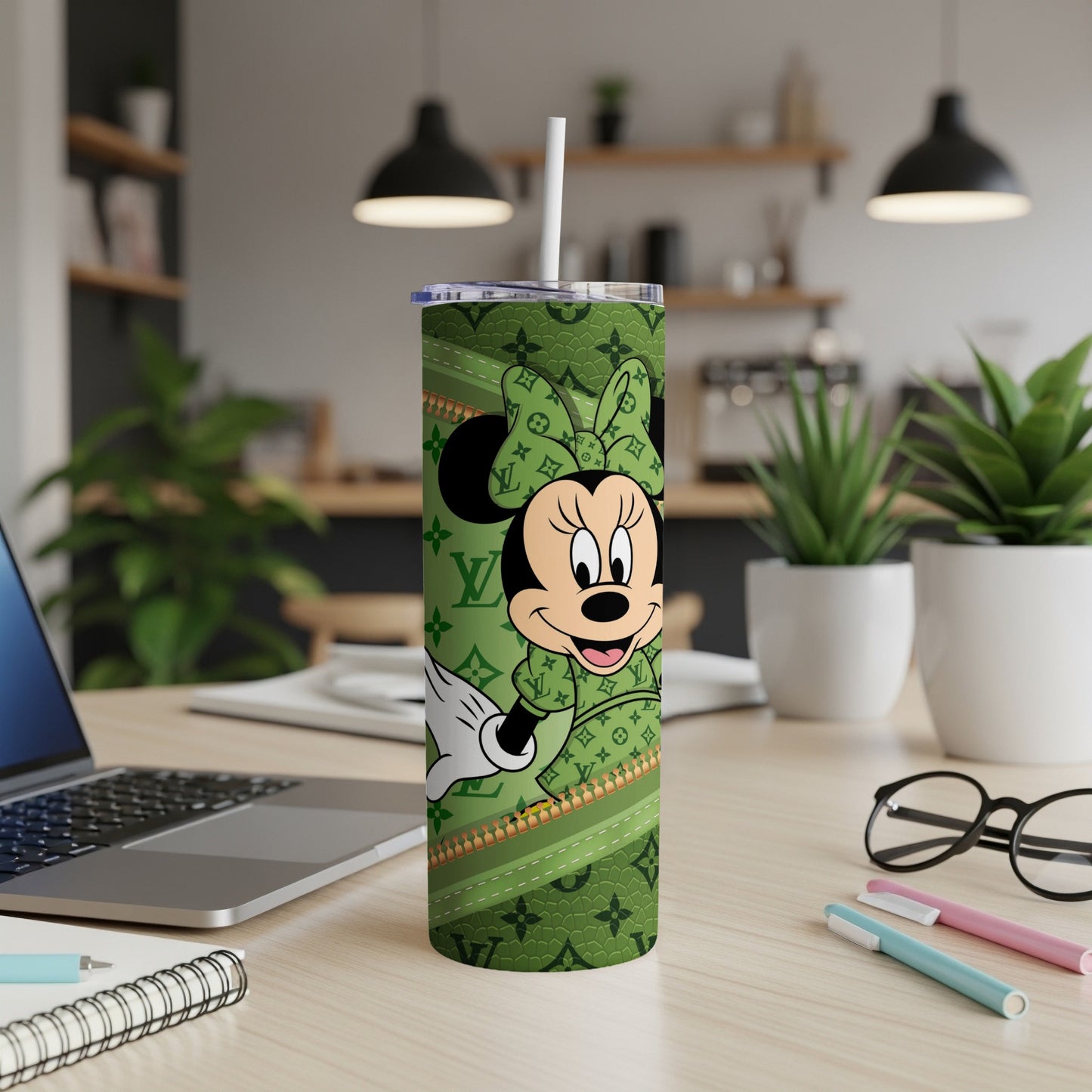 Minnie Mouse tumbler with green LV pattern and straw.