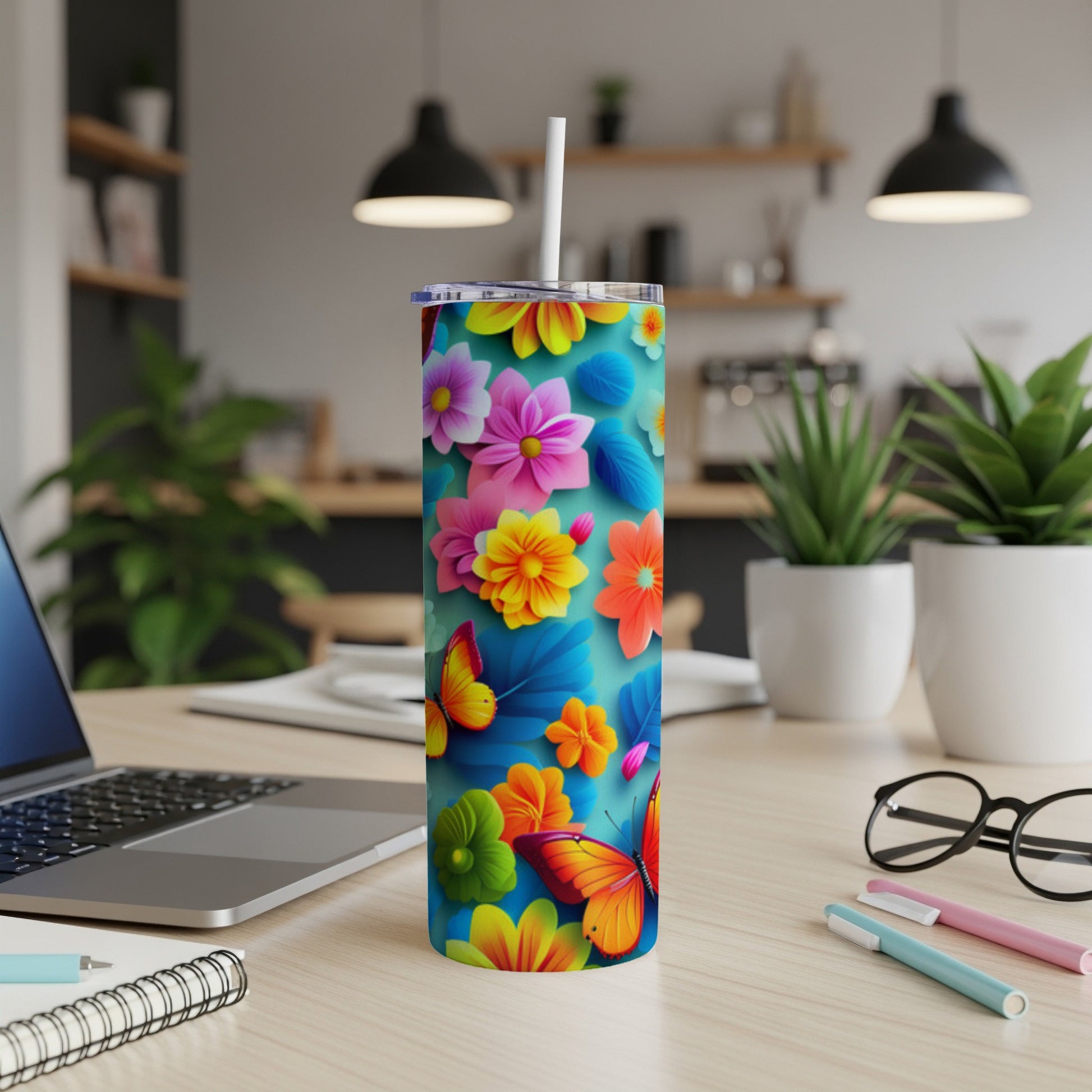 Tall tumbler with vibrant floral and butterfly design.