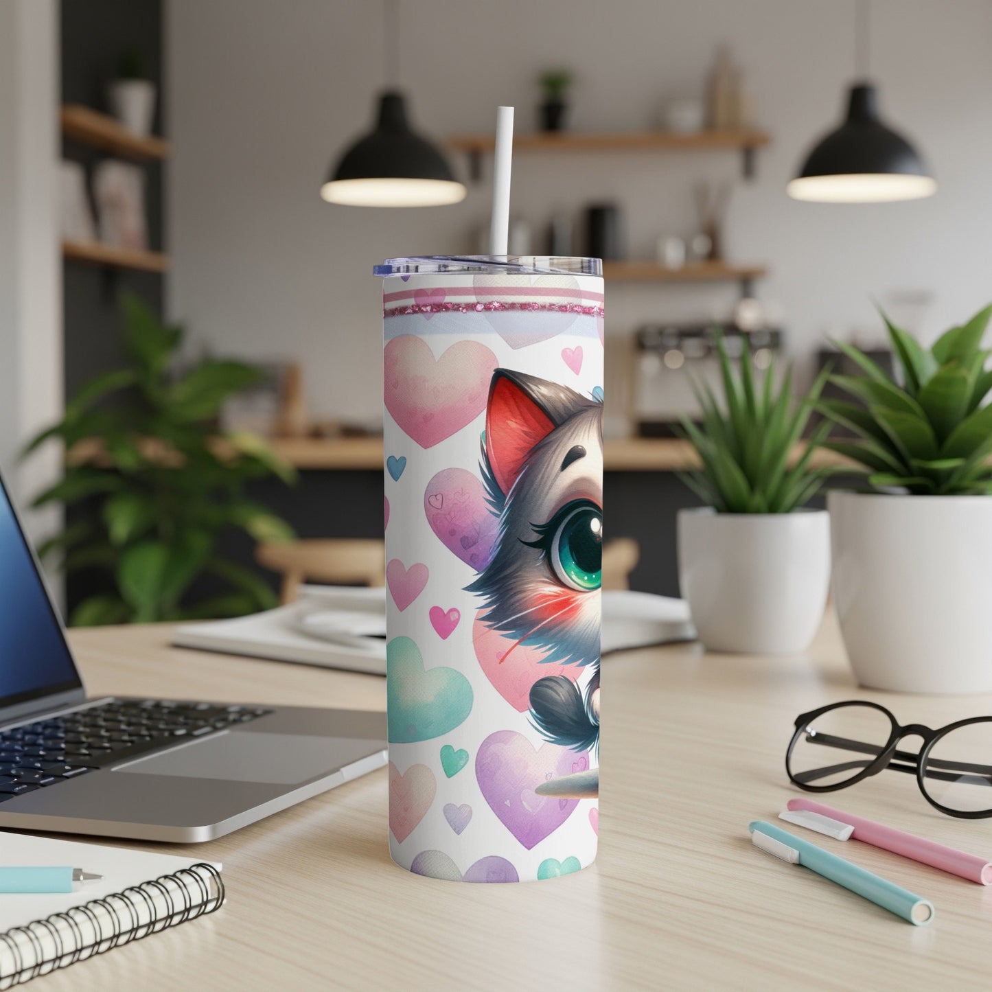 Cute cat with hearts on a white tumbler with a straw.