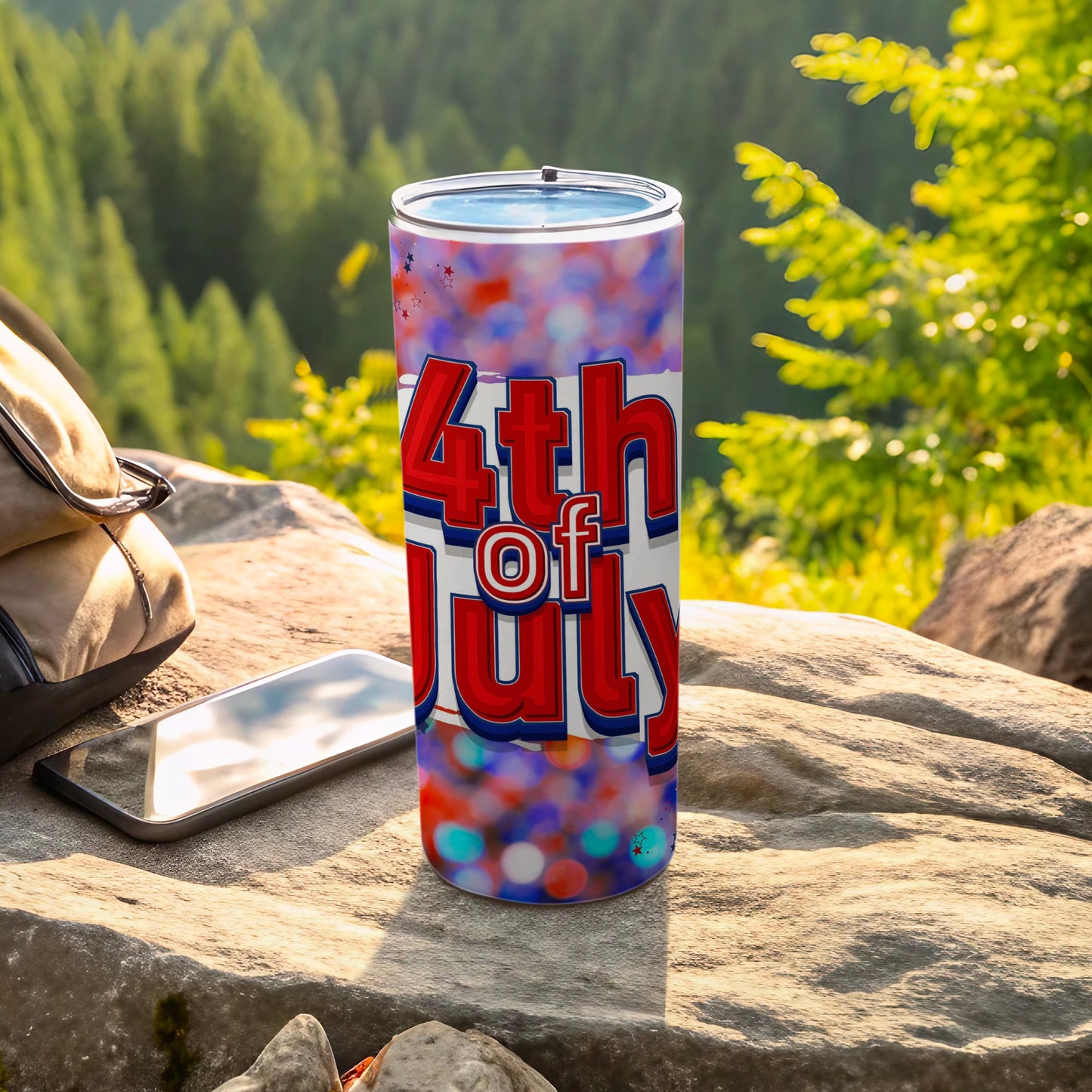 Tumbler with "4th of July" text and patriotic confetti design.