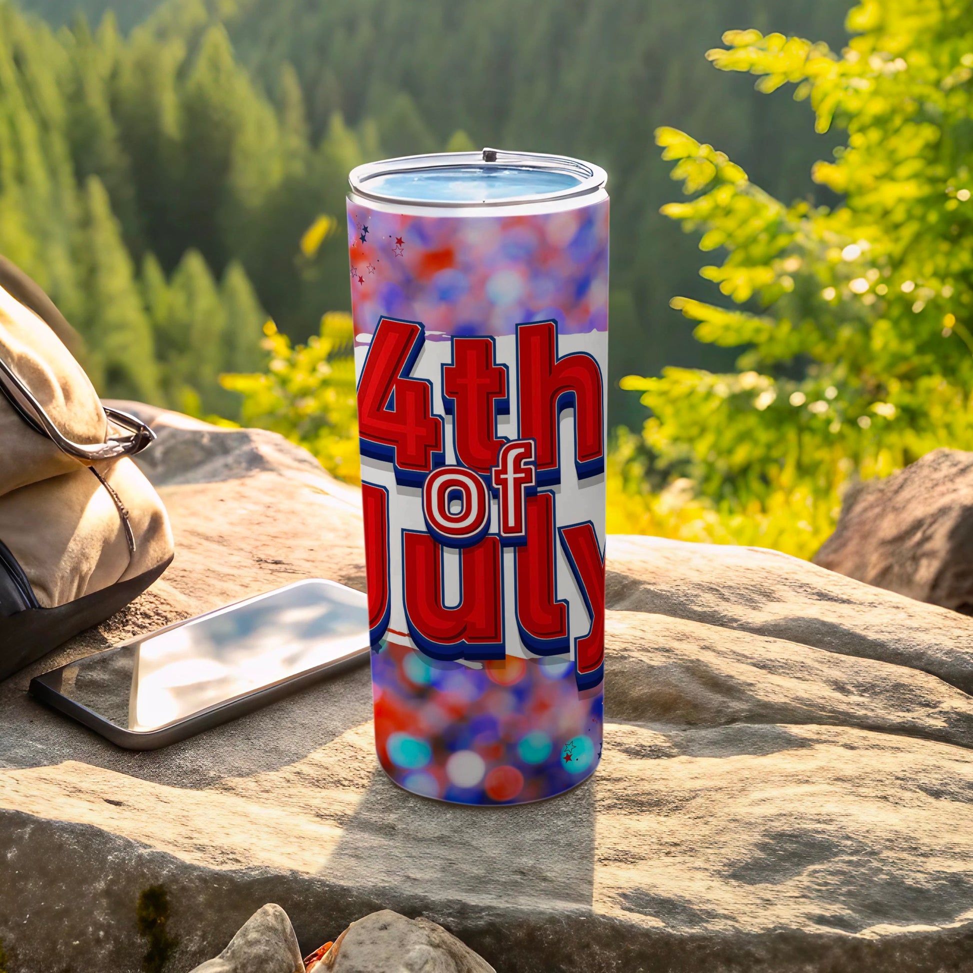 Tumbler with "4th of July" text and patriotic confetti design.