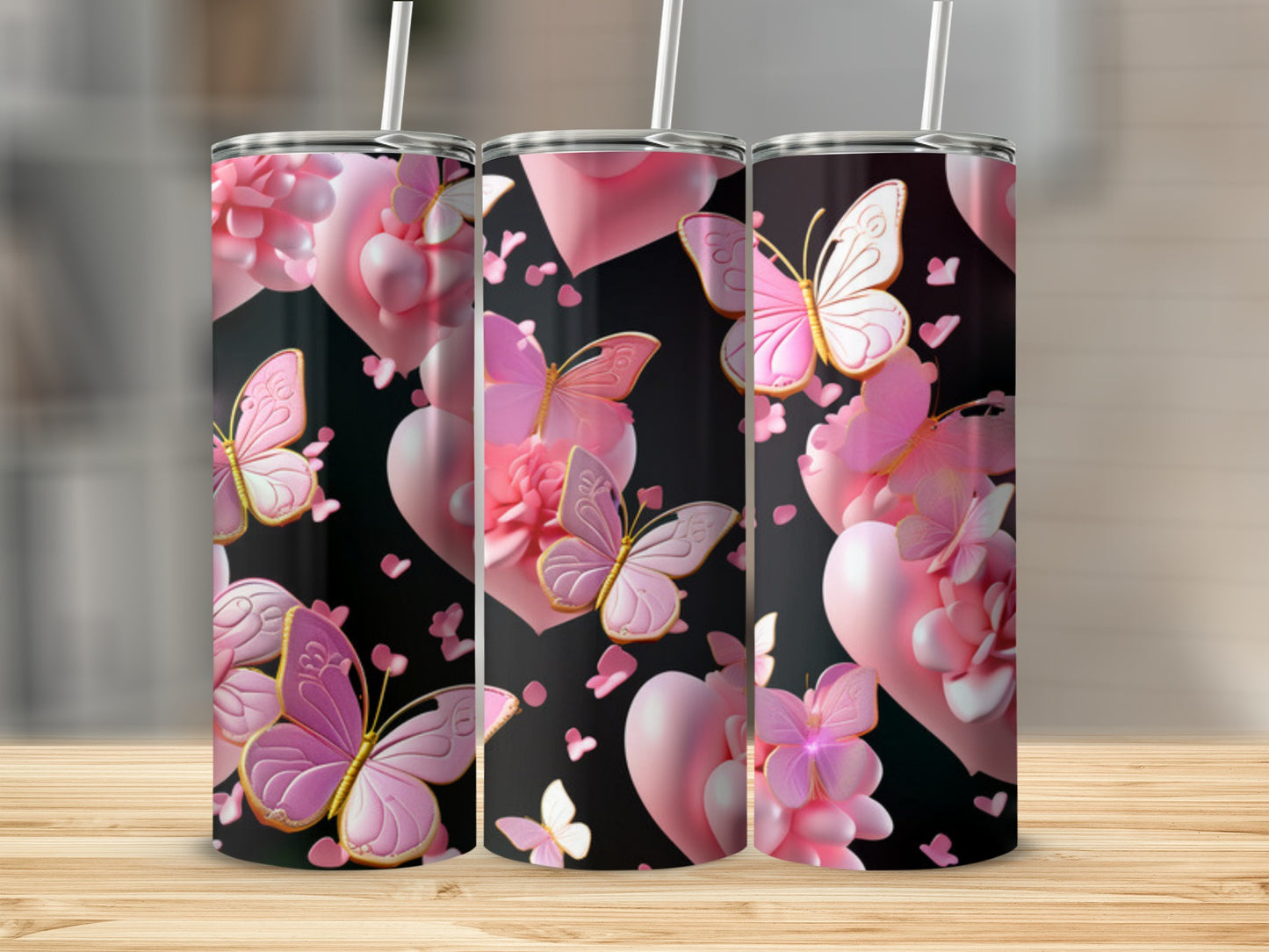 Pink tumblers with butterflies and hearts against a black background.