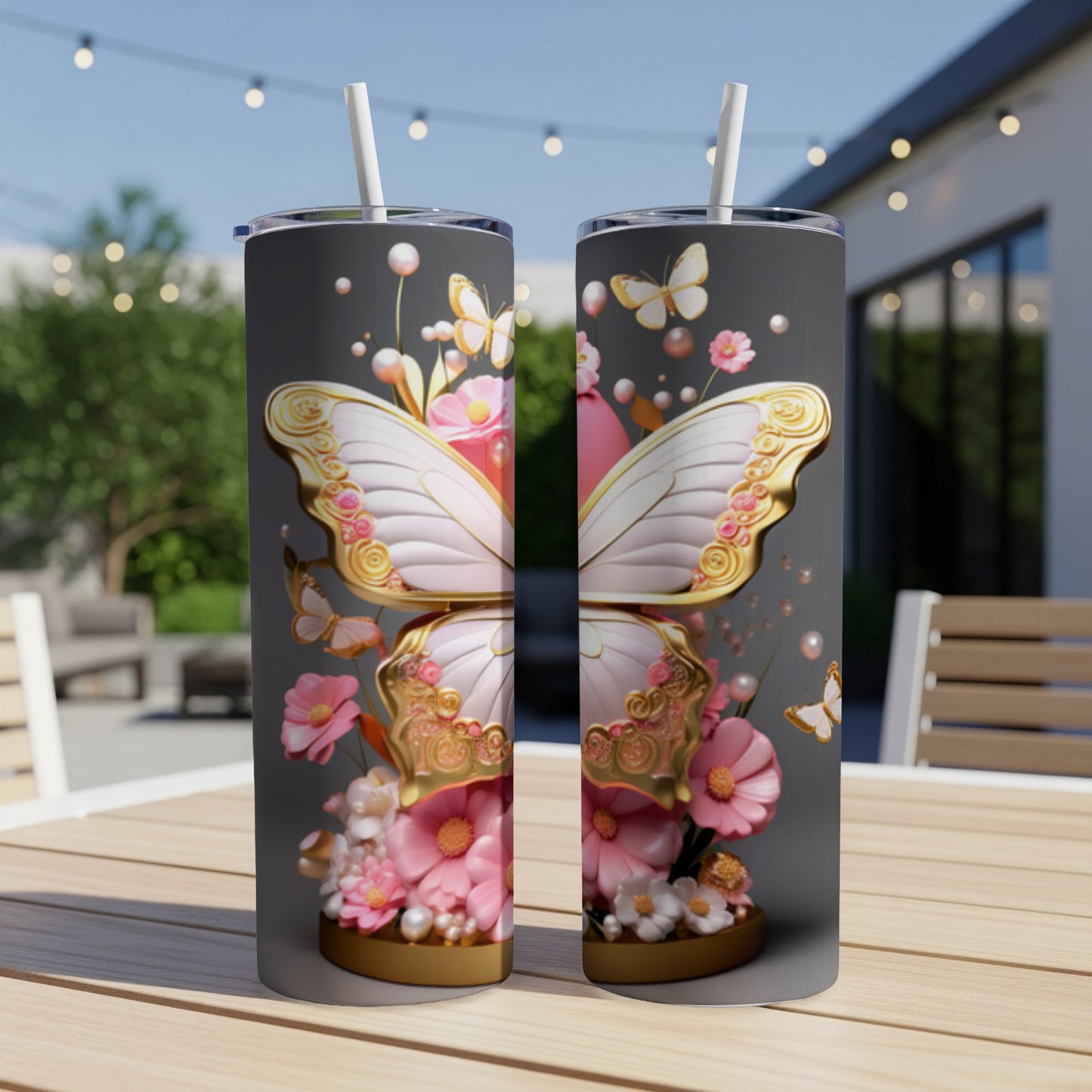 Two tumblers with pink and gold butterfly and floral designs.