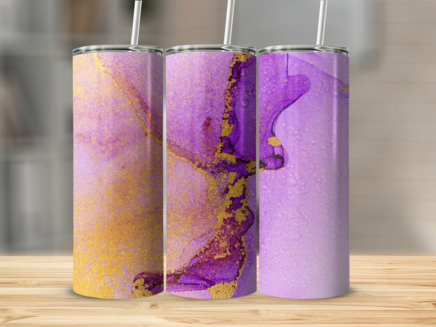 Three tumblers with purple and gold marbled abstract design.