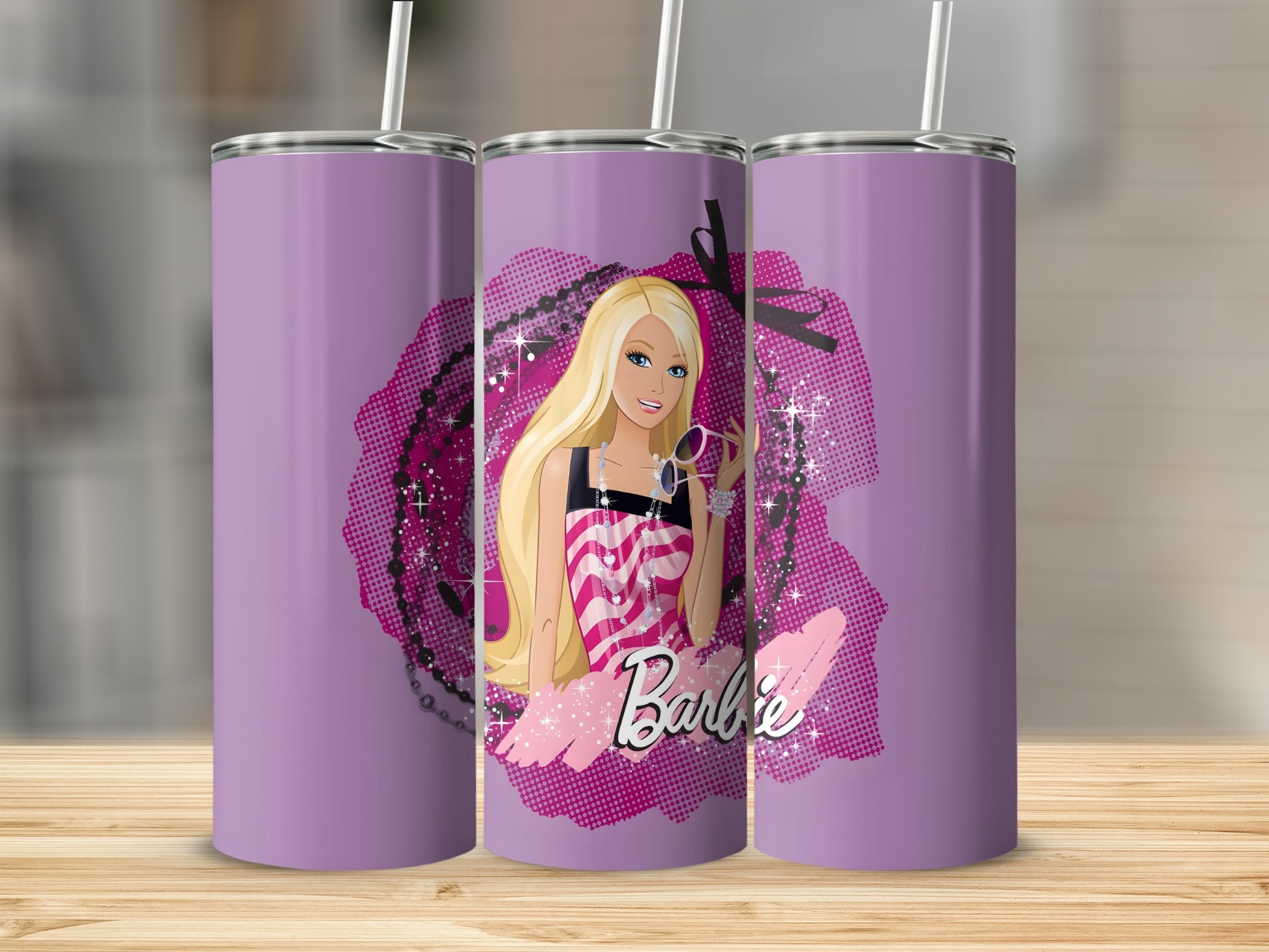 Barbie graphic on purple tumbler with pink accents and straw.