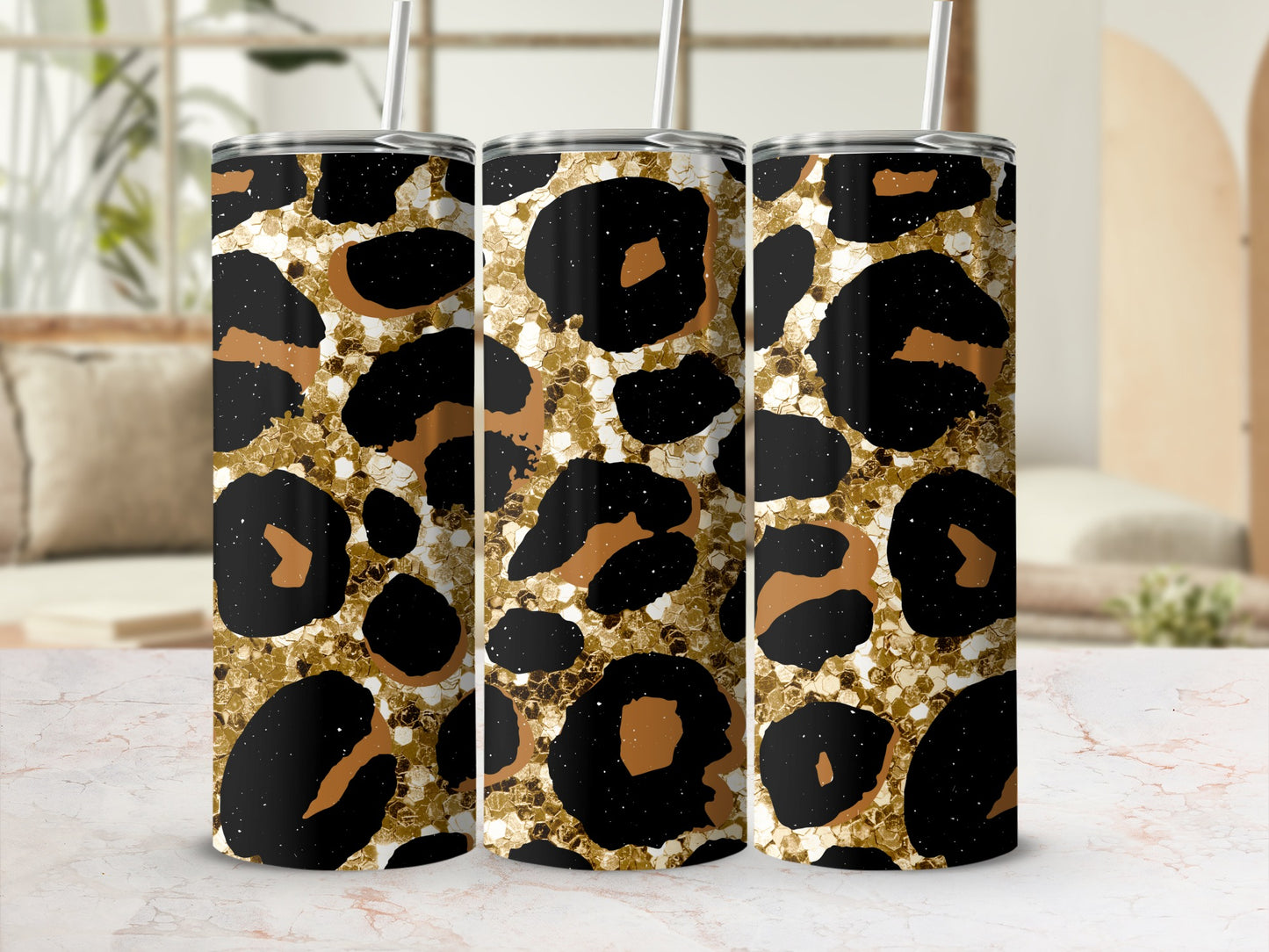 Three tumblers with a gold and black leopard print pattern.