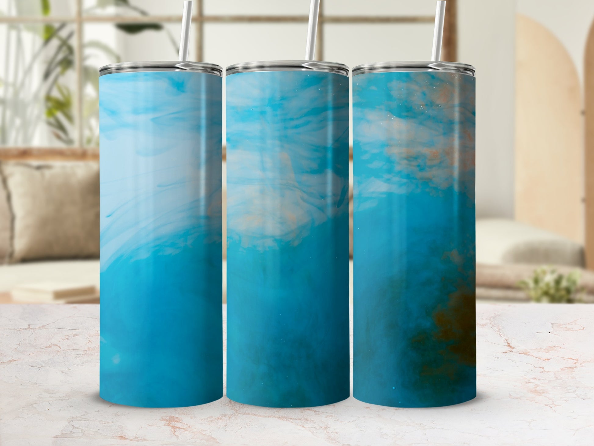 Three tall tumblers with abstract blue and white marbled designs.