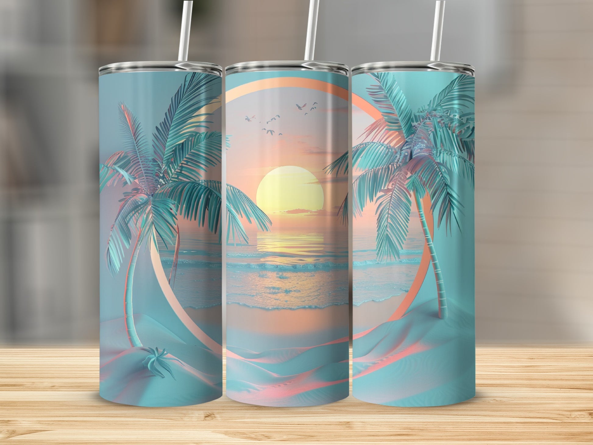 Three tumblers with a sunset beach scene and palm trees.