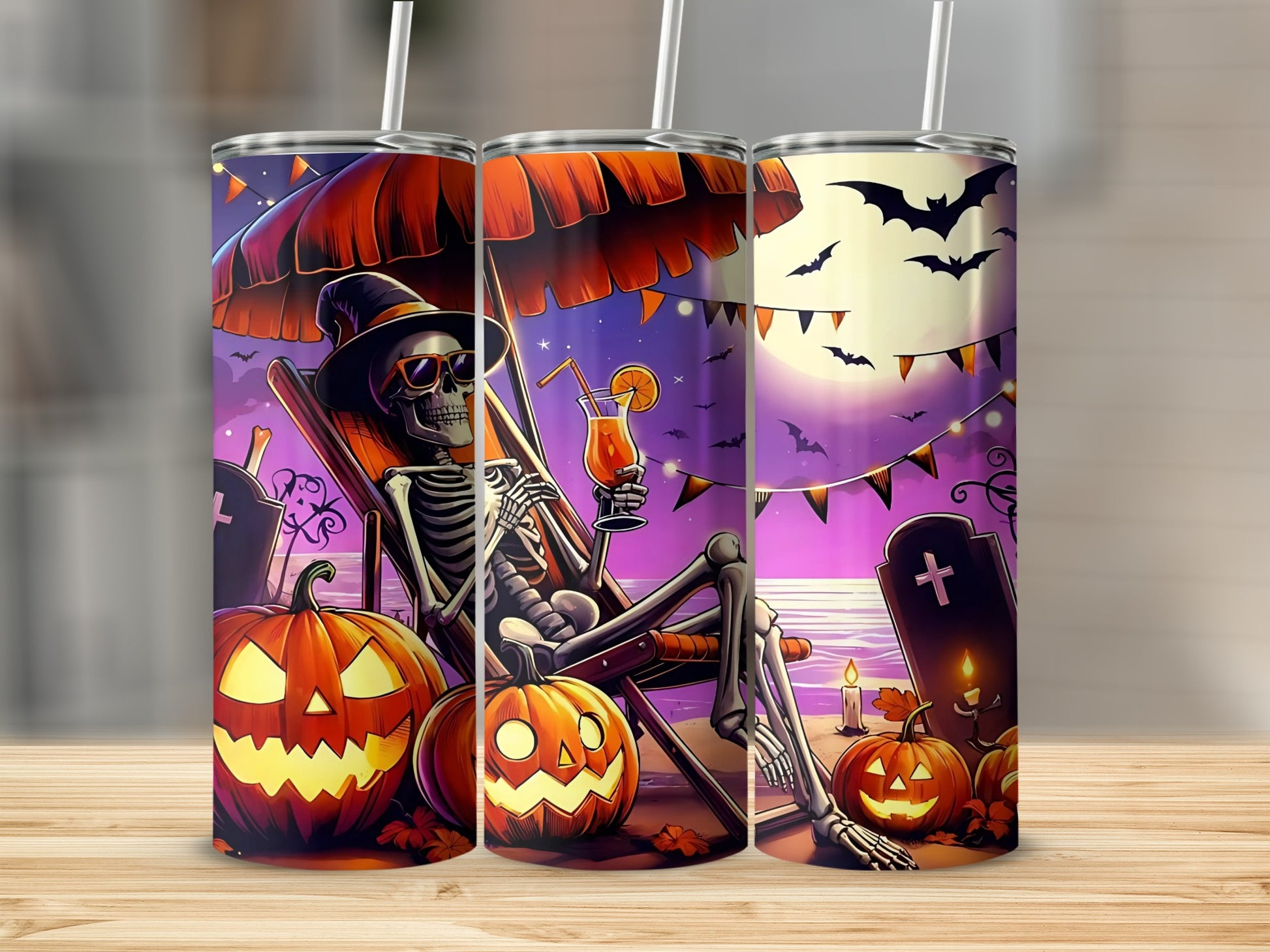 Halloween tumblers with skeleton, pumpkins, bats, moon, and beach scene.
