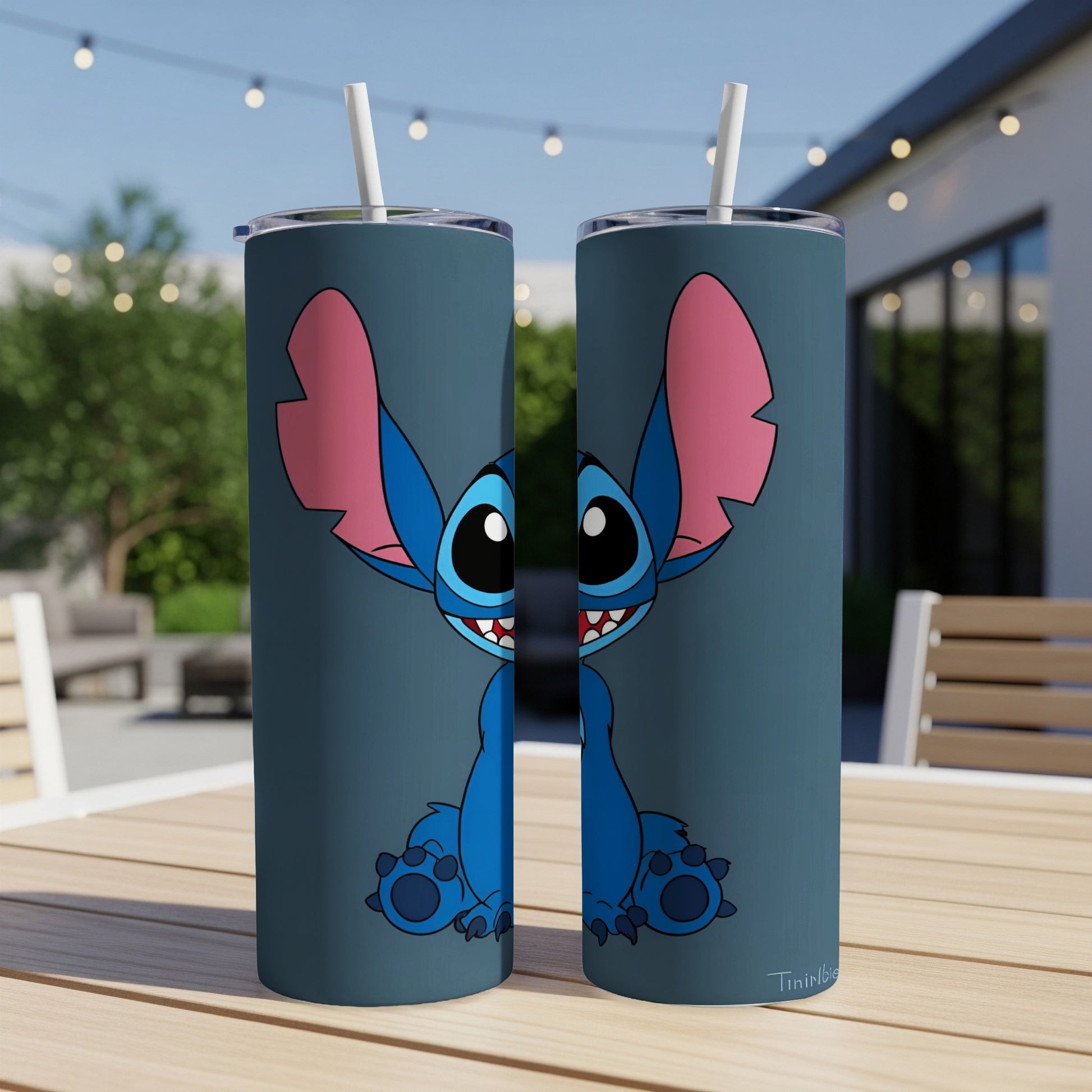 Blue Stitch character with large ears on two identical tumblers.