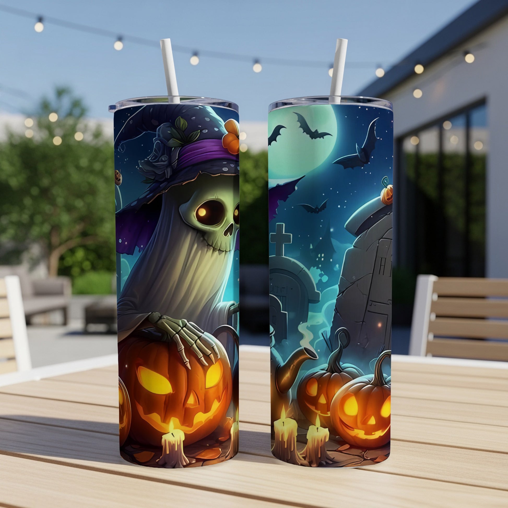 Two tumblers with Halloween designs: a ghost with a pumpkin, and a graveyard scene with bats.