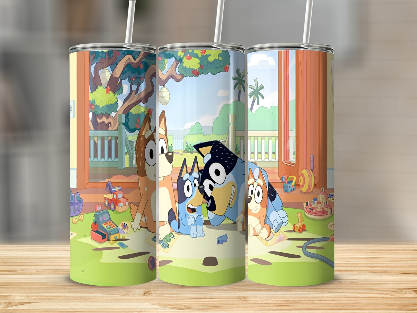 Bluey and Bingo characters on a tumbler with toys and a backyard scene.