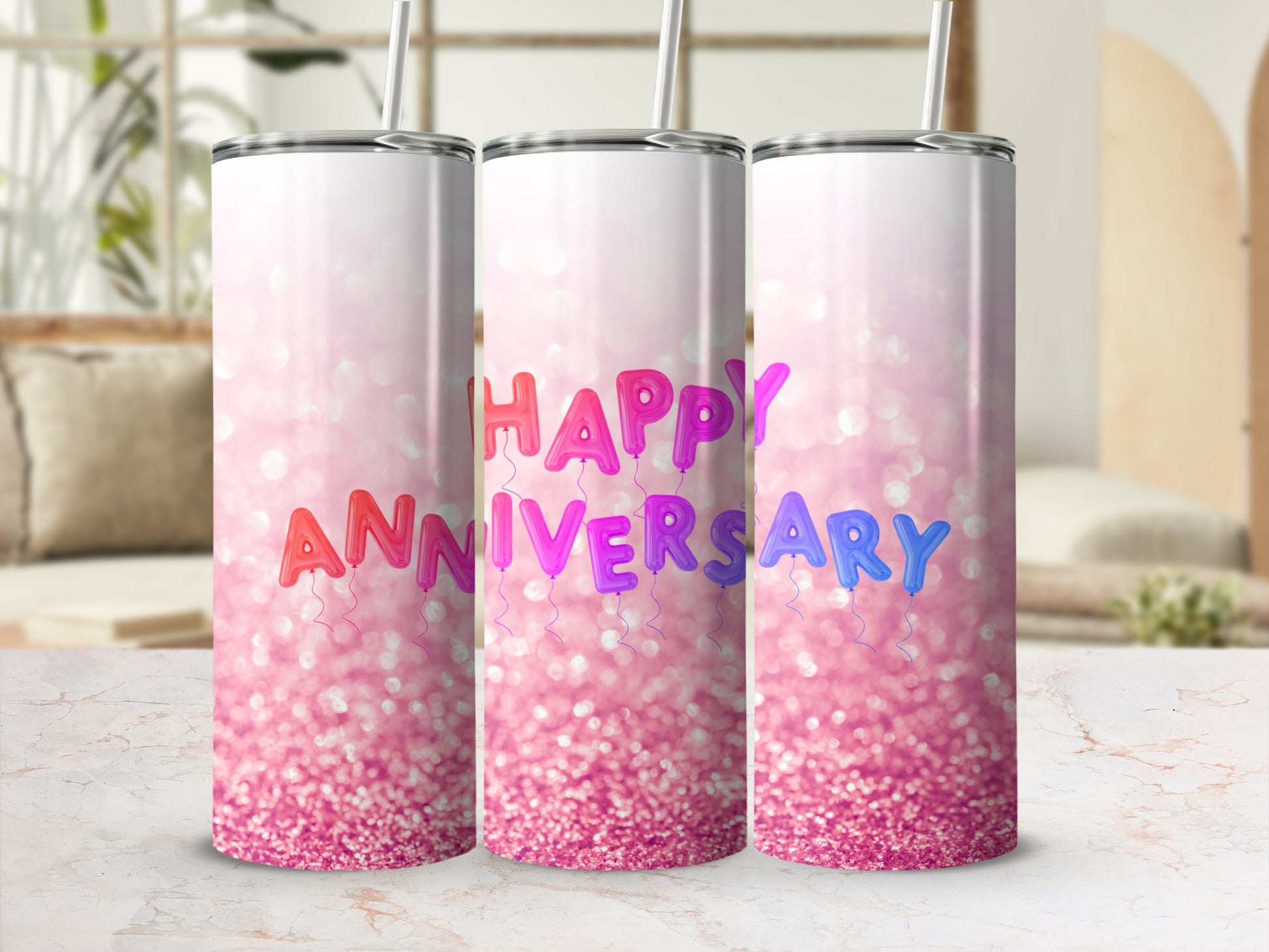 Tumbler with "Happy Anniversary" in colorful balloon letters on a pink glitter background.