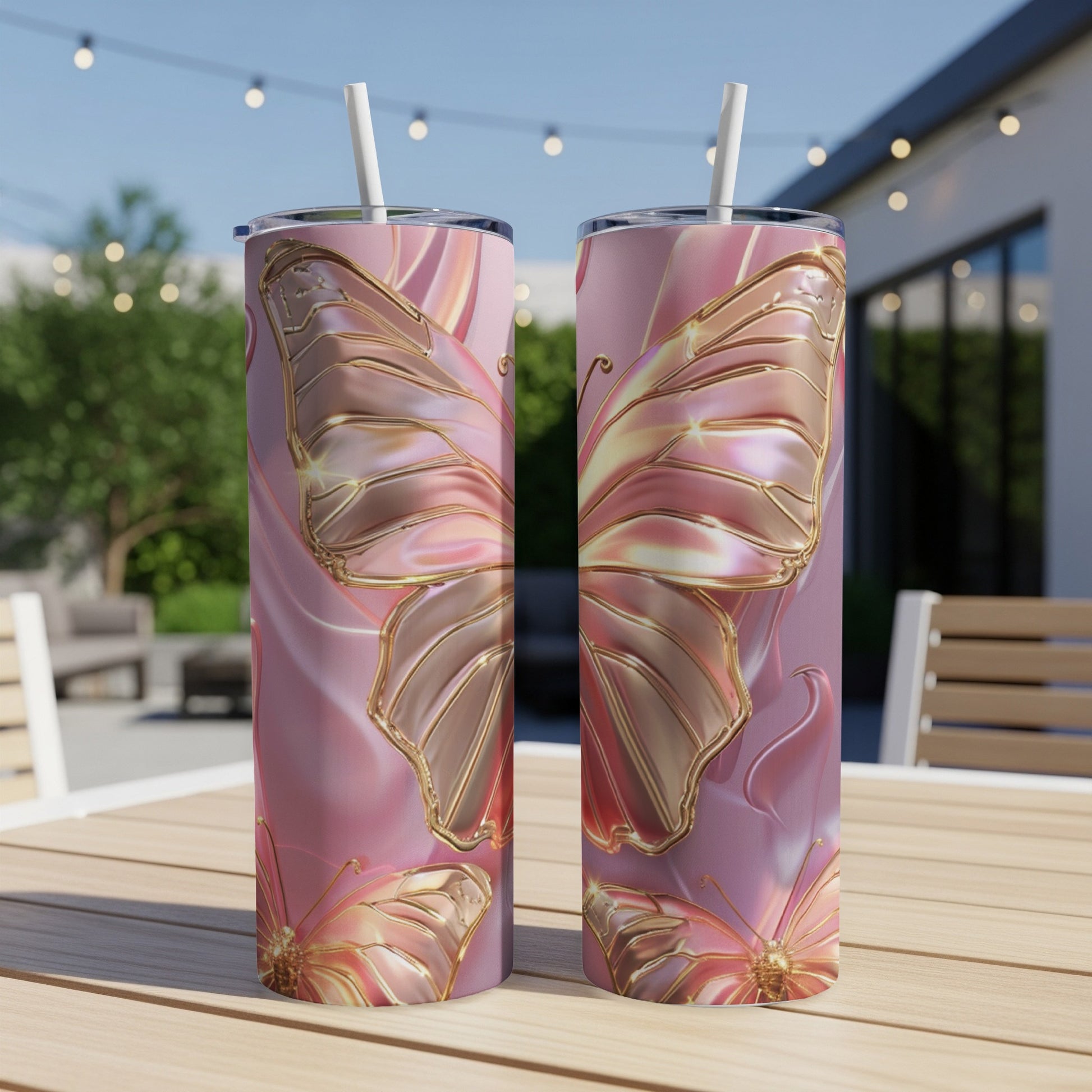 Pink tumbler with iridescent butterfly wings and floral details.