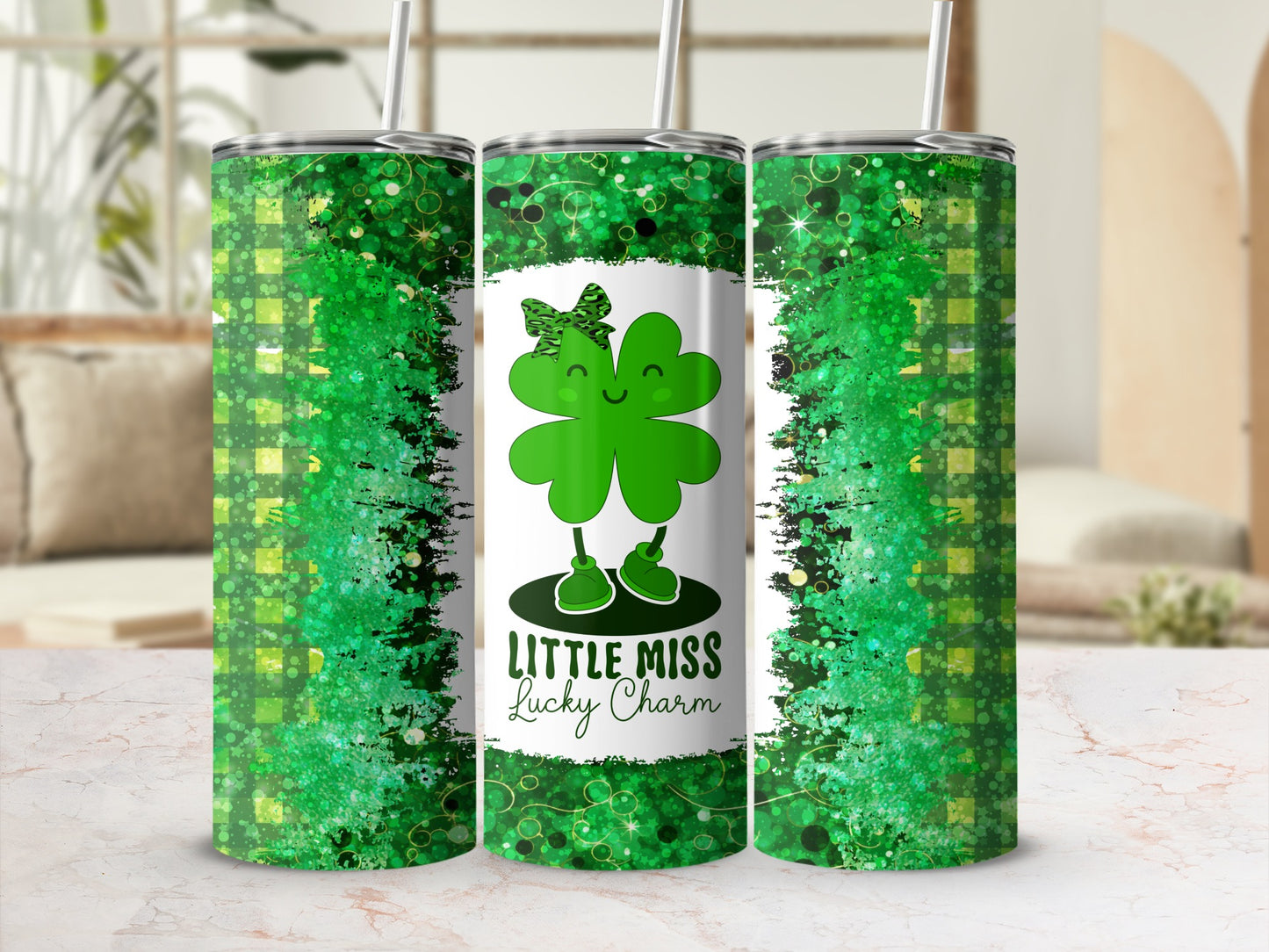 Green tumbler with shamrock and "Little Miss Lucky Charm" text.
