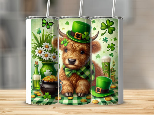 St. Patrick's Day Highland cow with clover, beer, and gold coins.