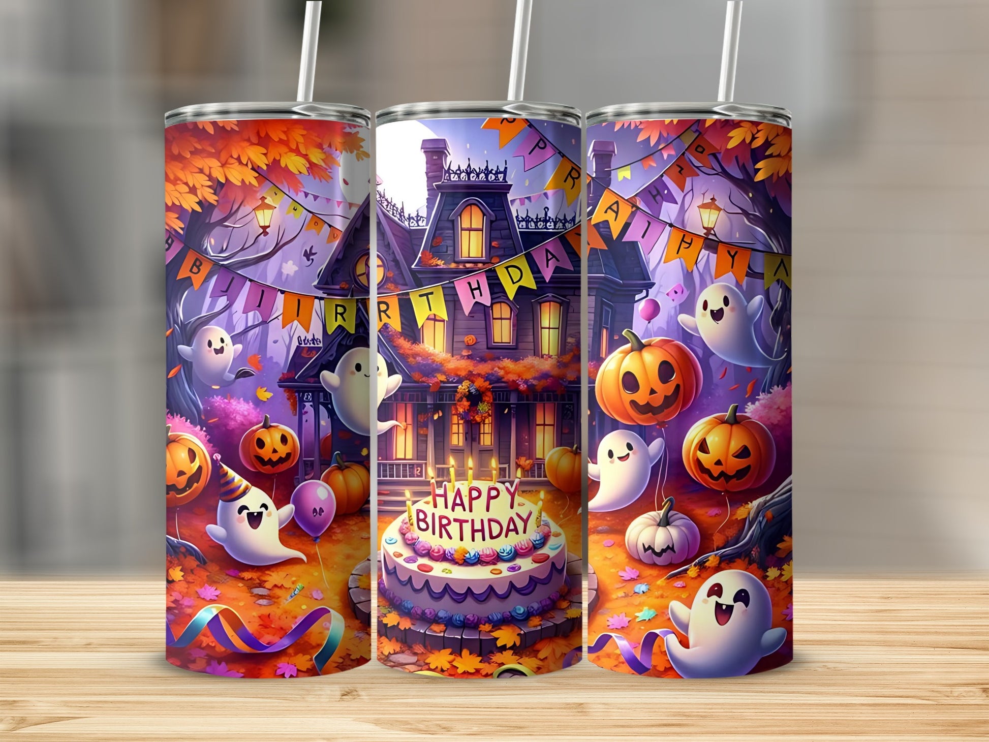 Halloween birthday theme tumblers with ghosts, pumpkins, and a haunted house.