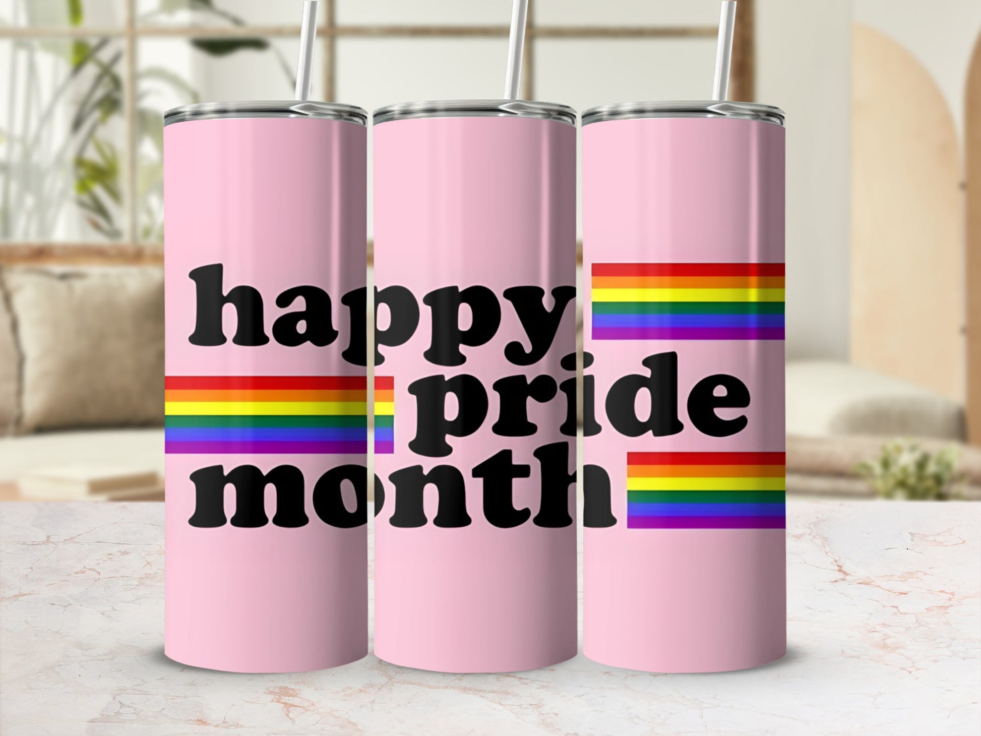 Pink tumbler with "happy pride month" text and rainbow stripes.