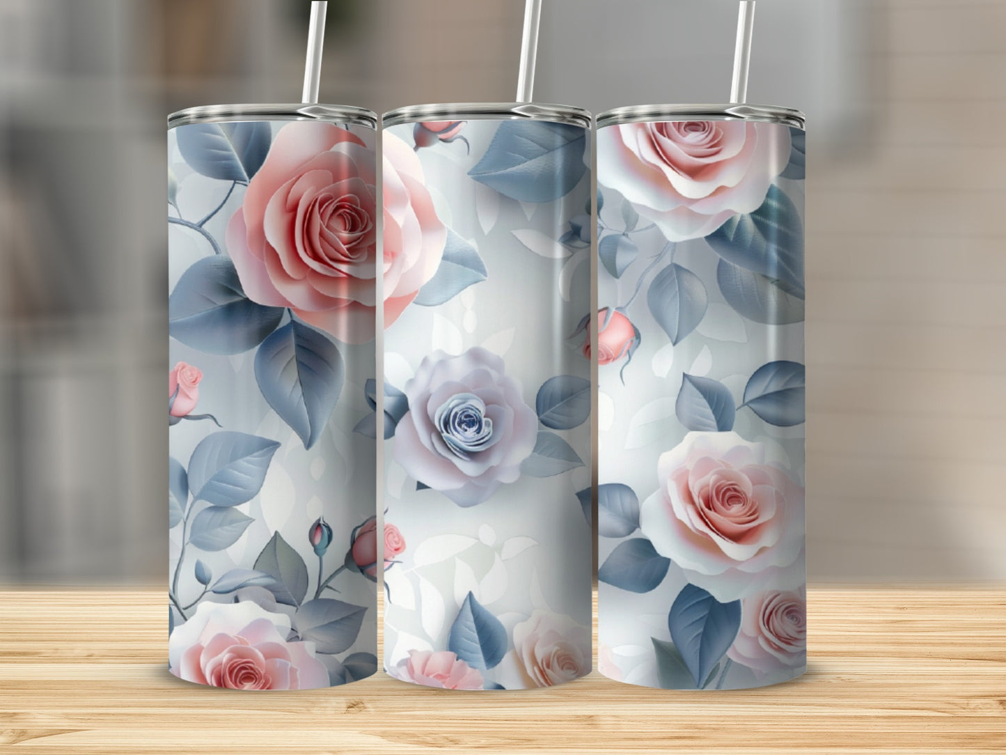 Three tumblers with pastel pink and blue roses and leaves design.
