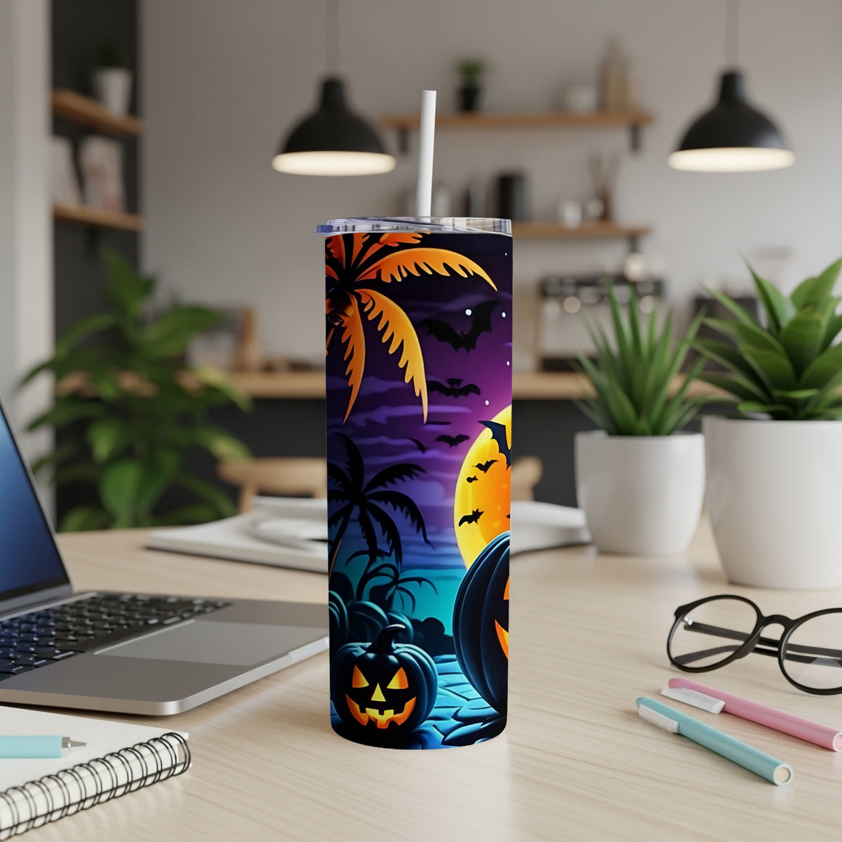 Halloween tumbler with pumpkins, palm trees, and a full moon design.