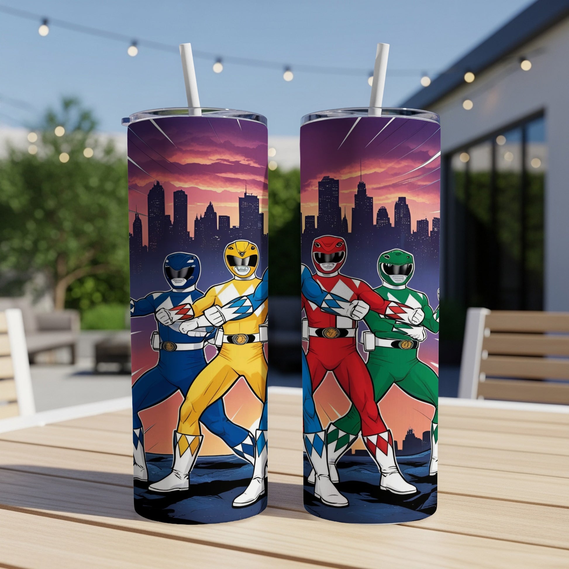 Two Power Rangers tumblers with city skyline background.