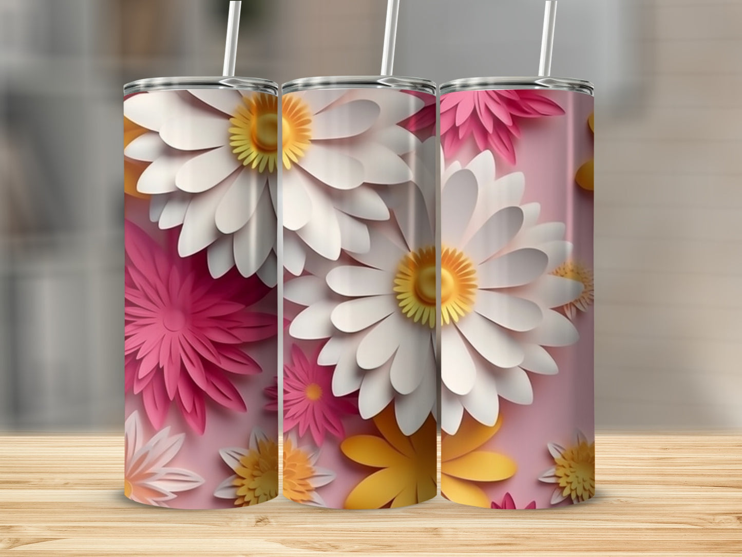 Three tumblers with white and pink daisy floral designs.