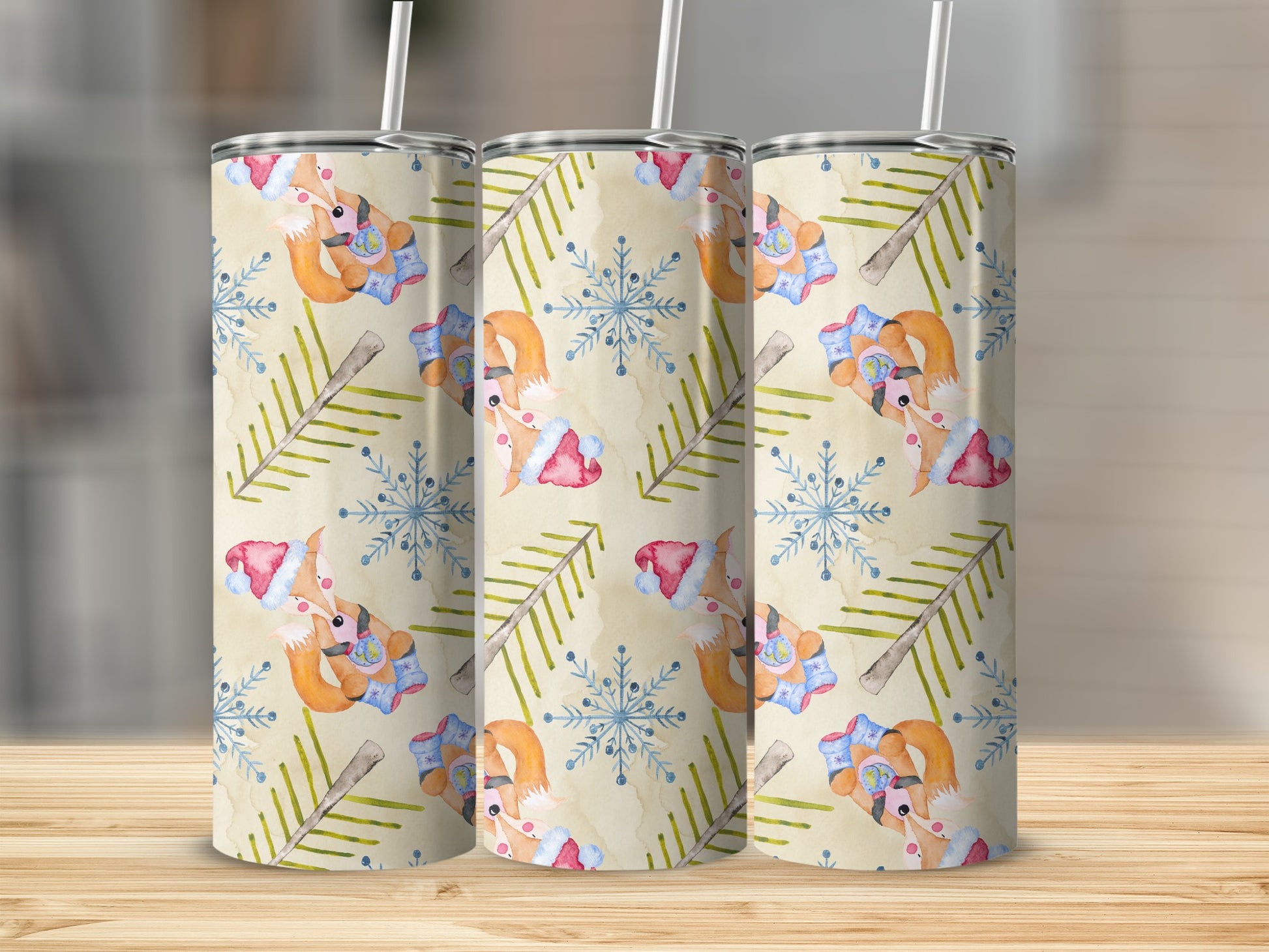 Three tumblers with a festive fox and snowflake pattern.