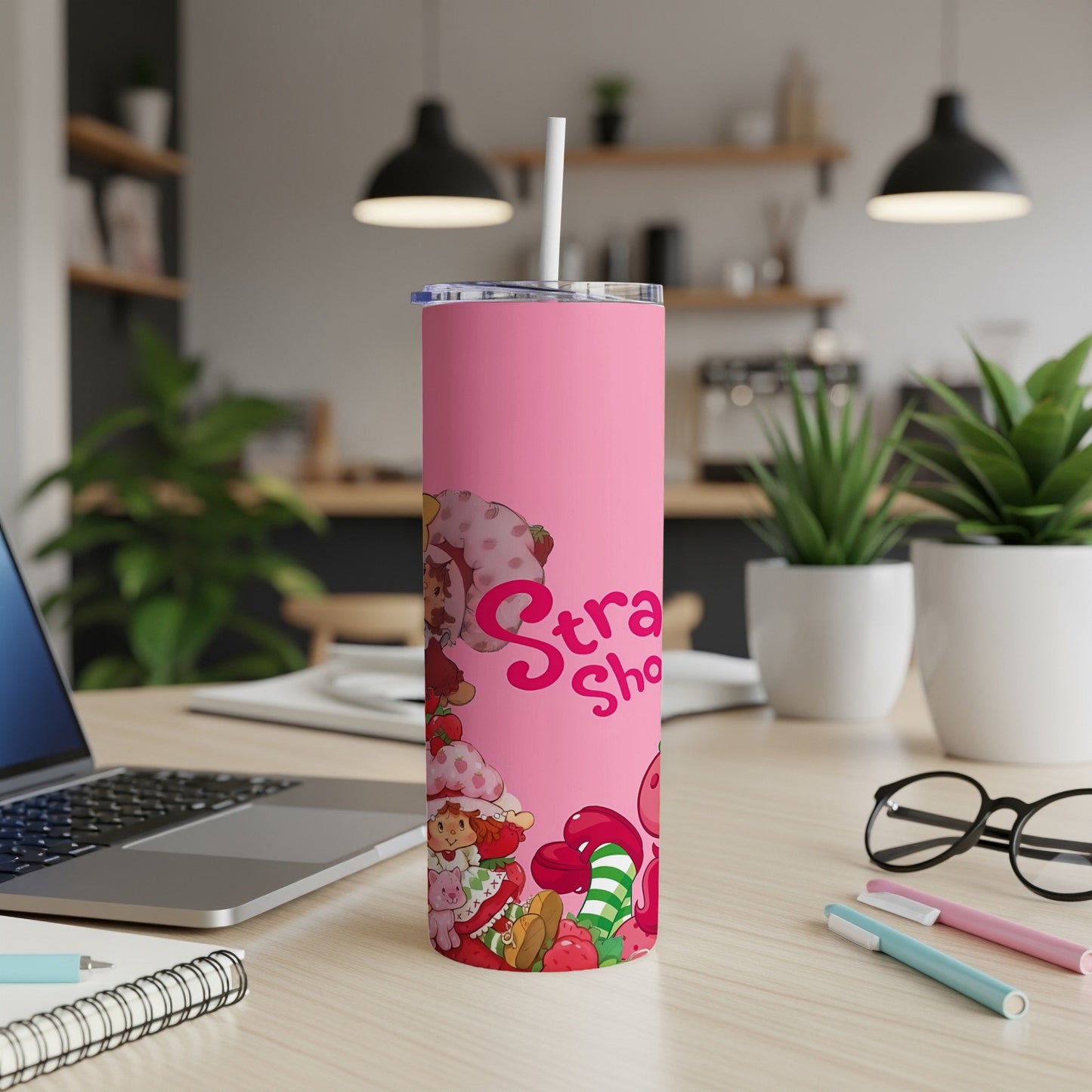 Pink tumbler with Strawberry Shortcake characters and "Strawberry Shortcake" text.