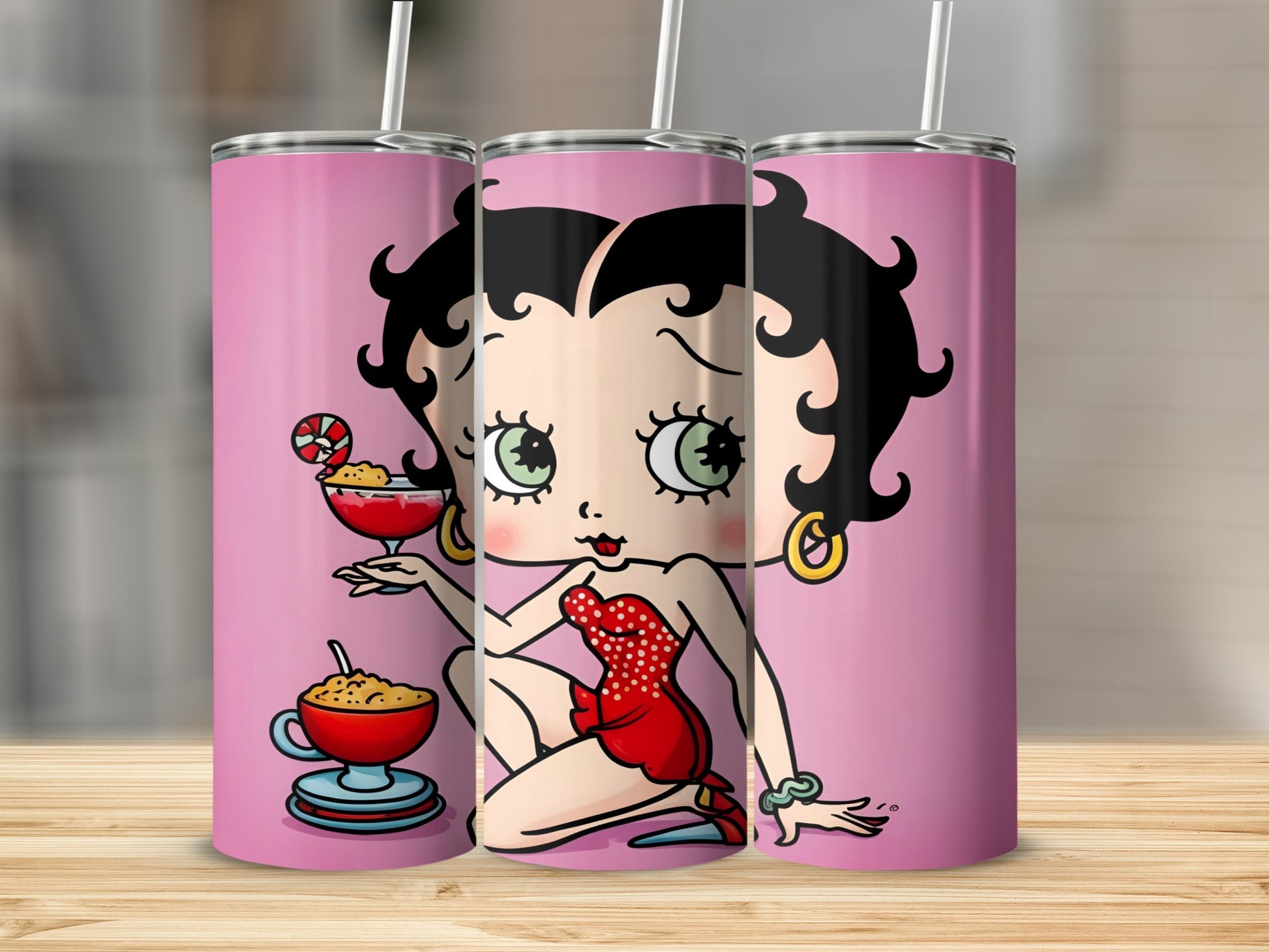 Betty Boop in red dress holding a drink with striped straw.