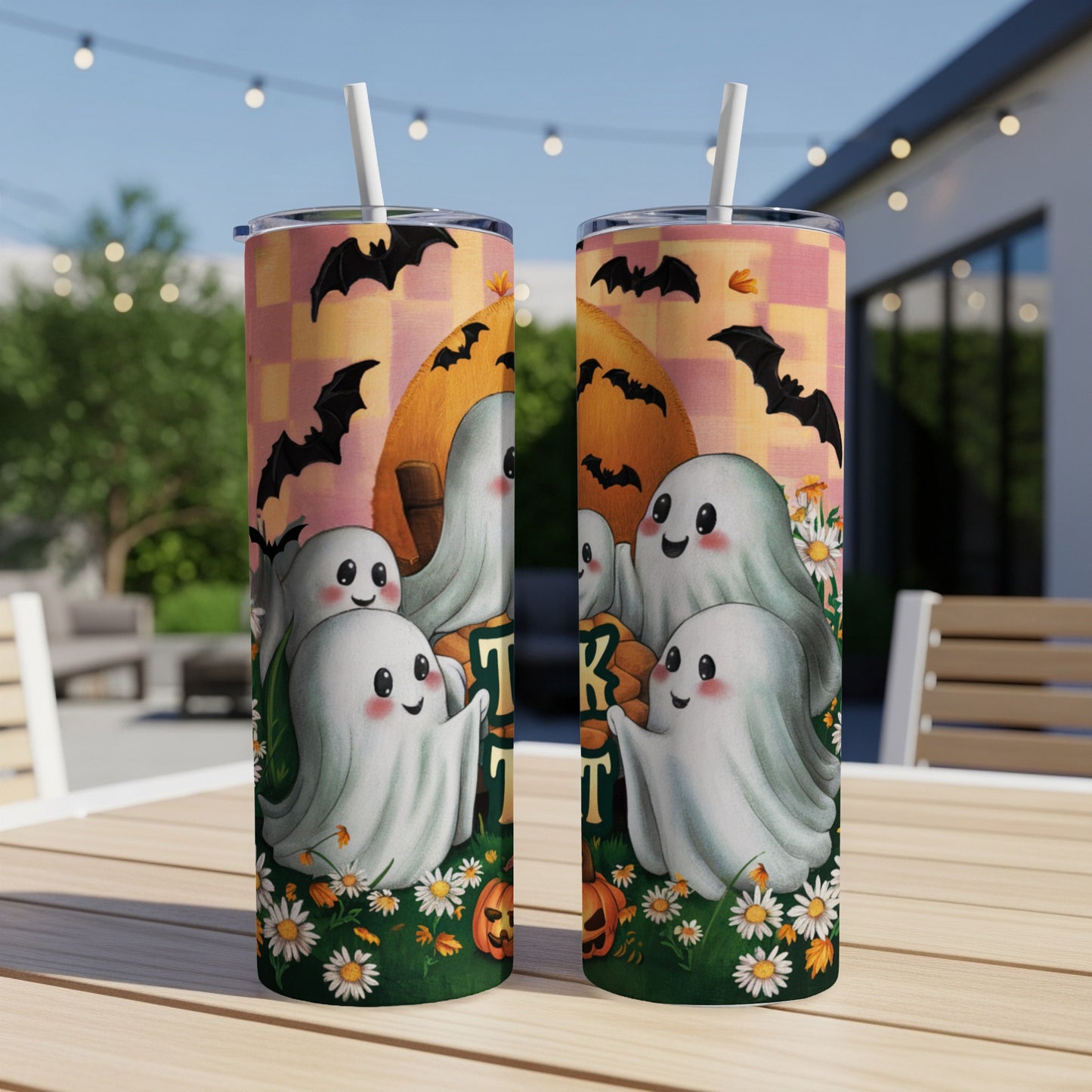 Two Halloween-themed tumblers with ghosts, bats, and pumpkins with "Trick or Treat" text.