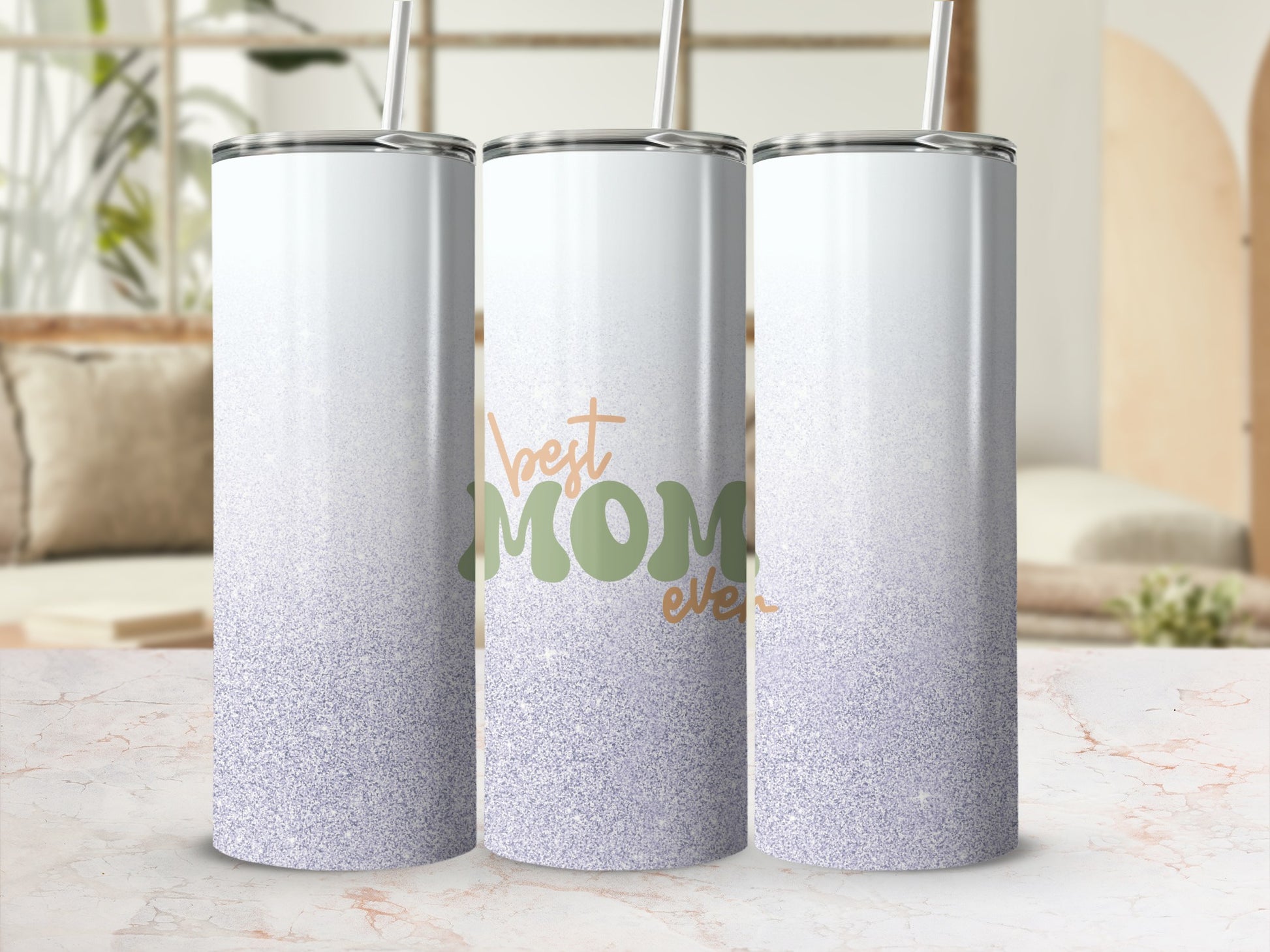 White tumbler with "Best Mom Ever" in green and orange text.