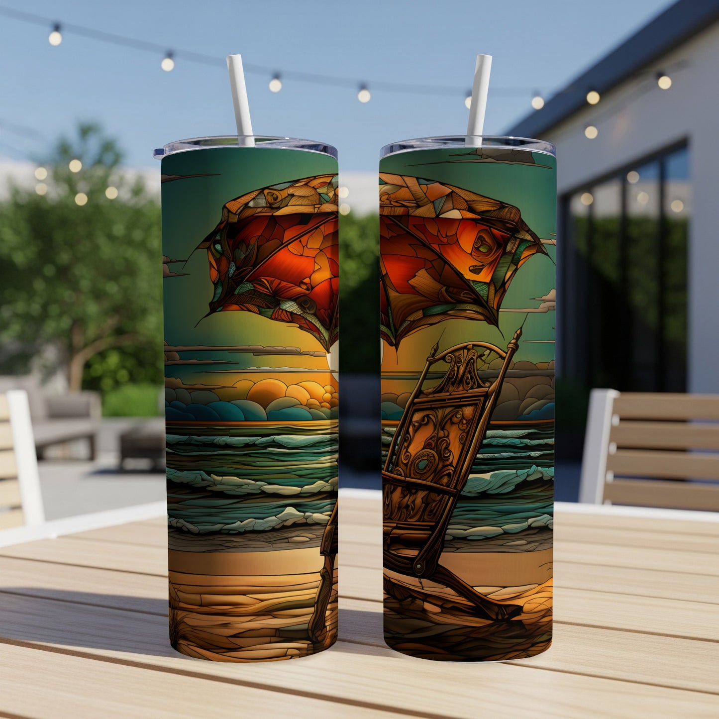 Two tumblers with a surreal beach scene featuring a large umbrella and lounge chair.