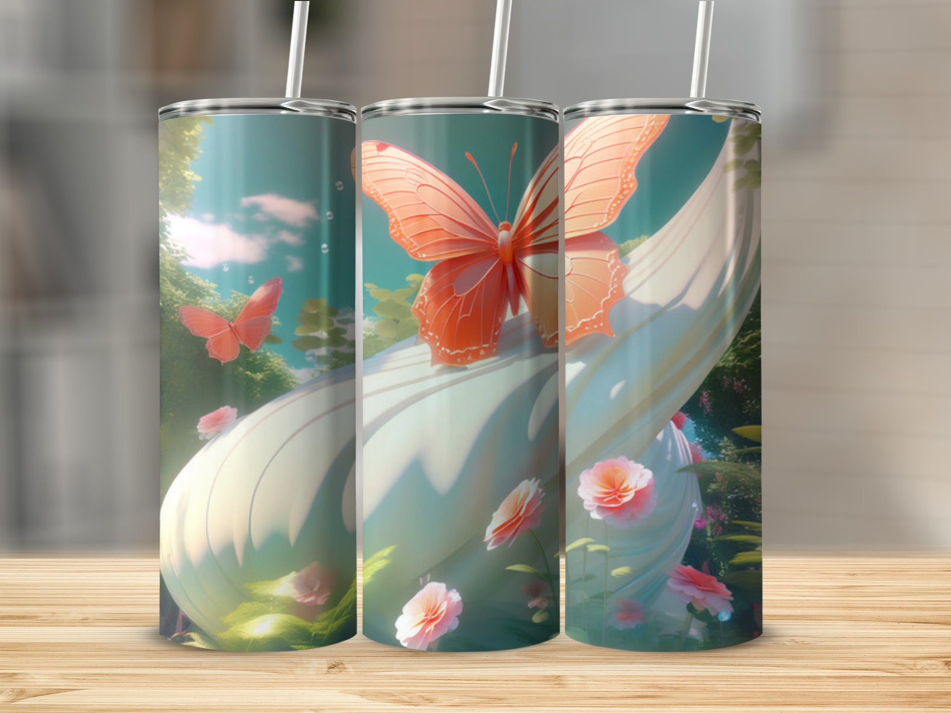 Three tall tumblers with a peach butterfly and floral design.
