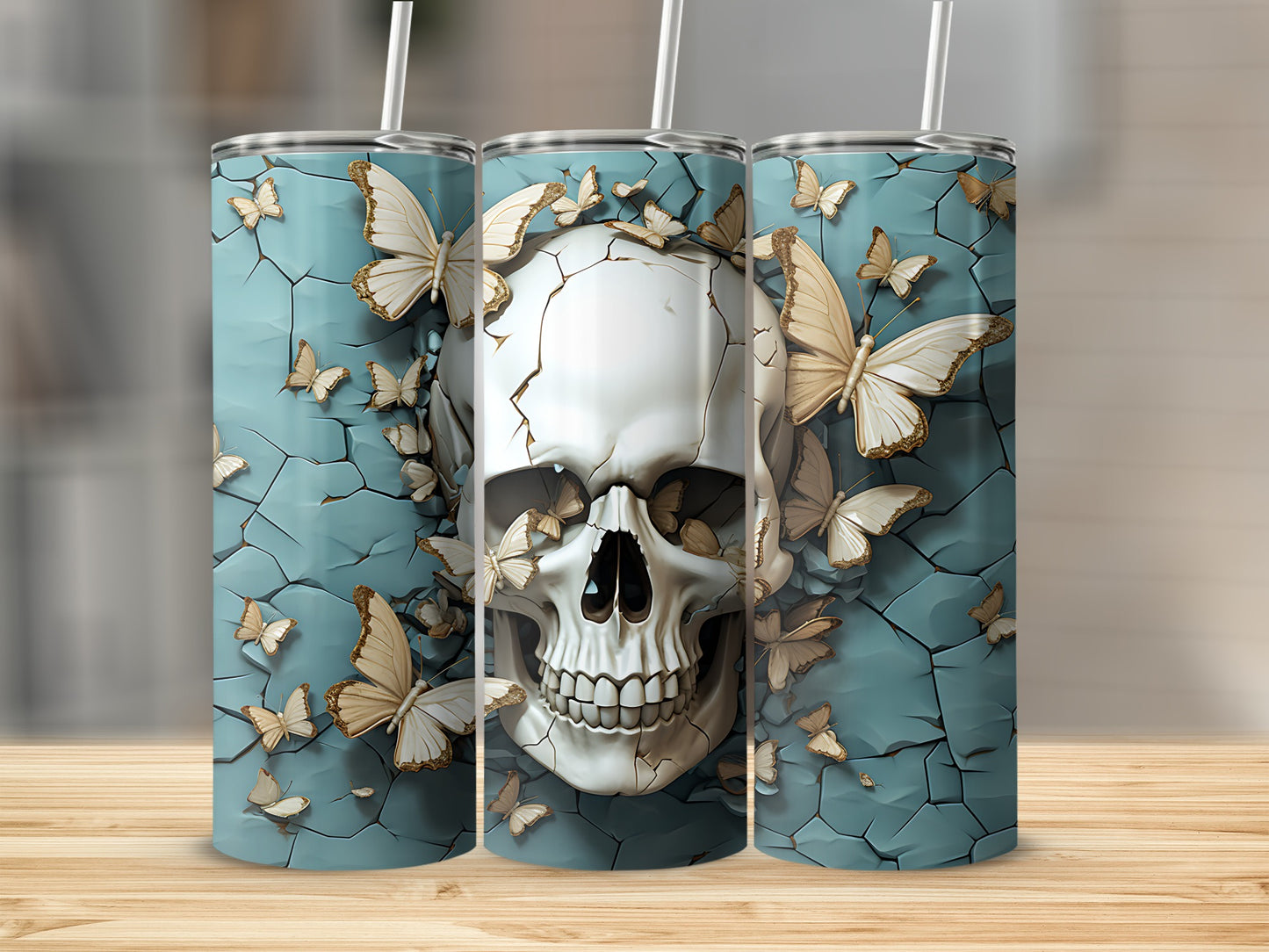 White skull with butterflies on cracked blue background, three tumblers.