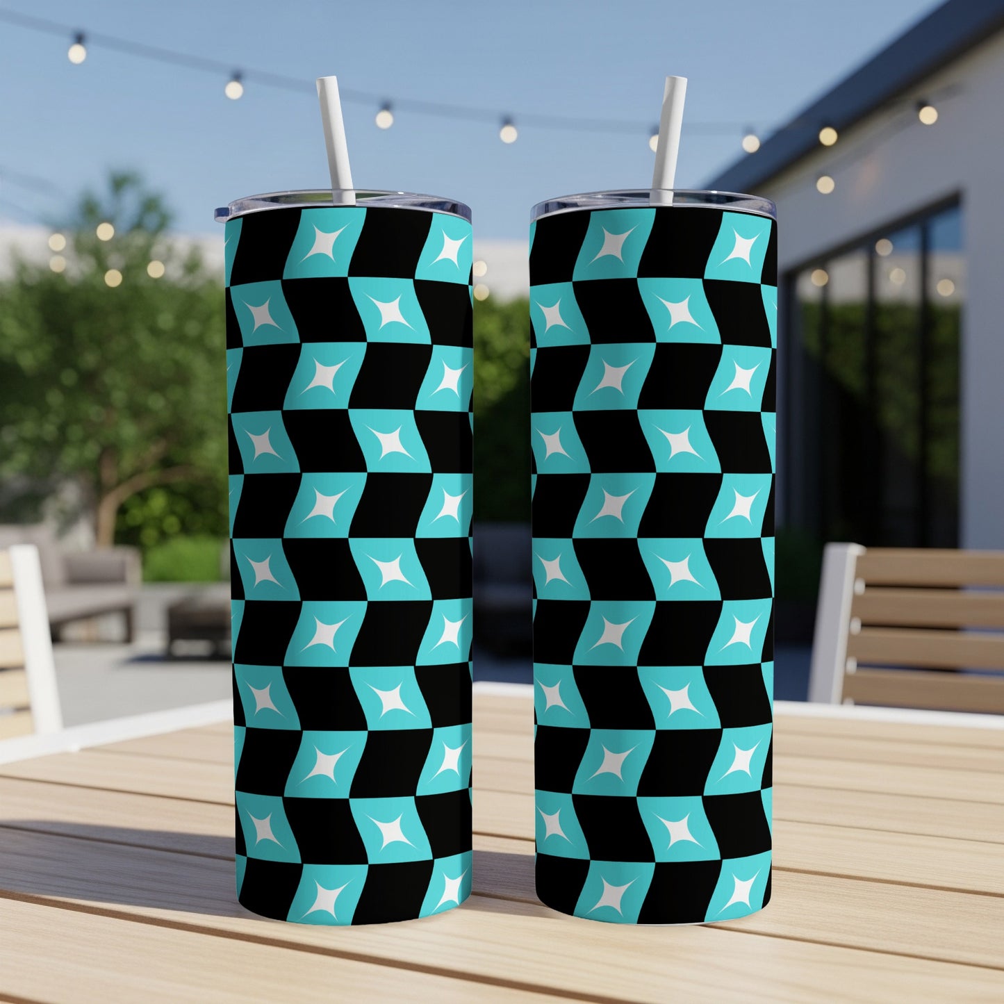 Two tall tumblers with a repeating teal and white geometric checkerboard pattern.