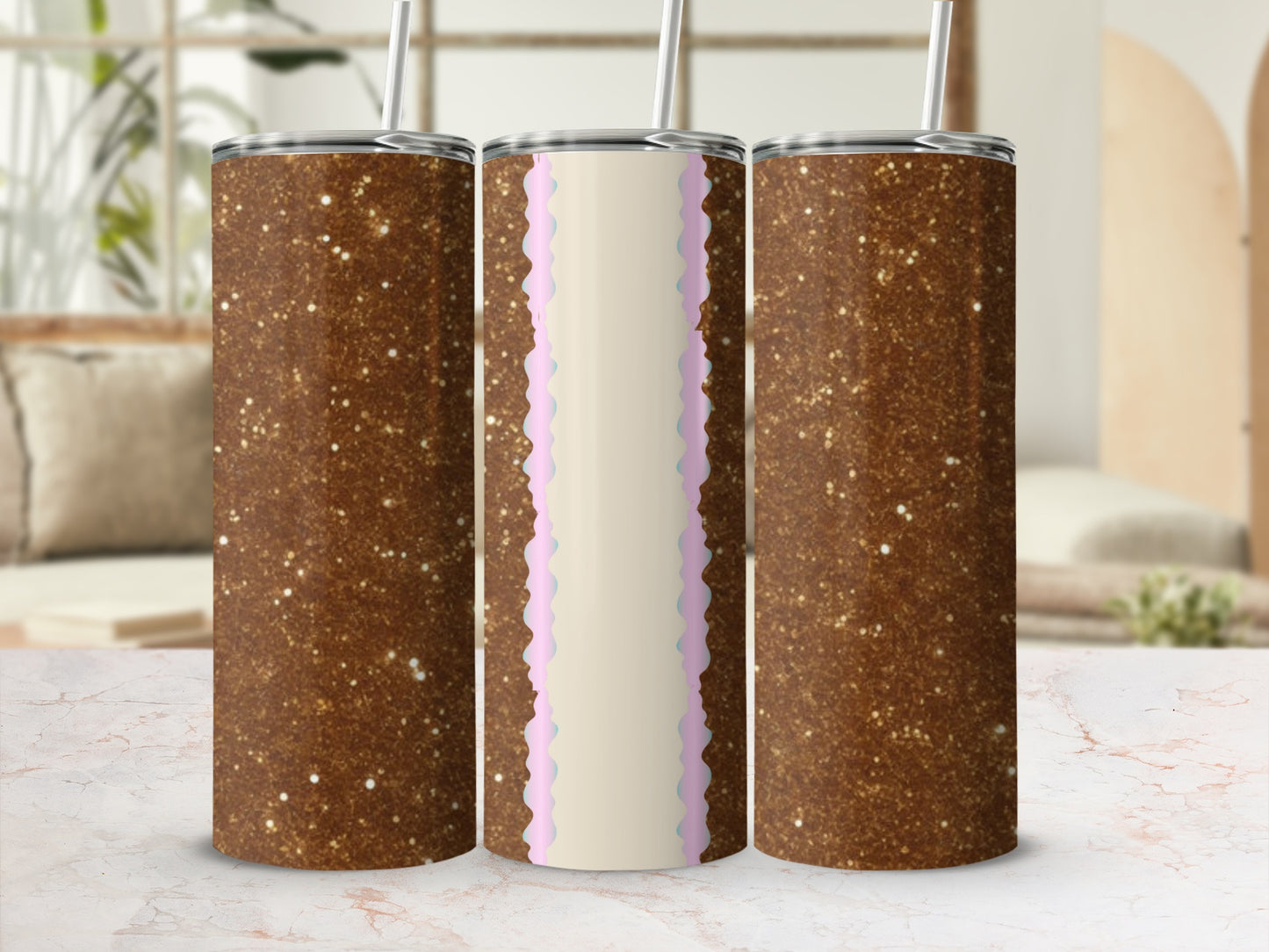 Three glitter tumblers, two with brown glitter, one with scalloped pink and blue detail.