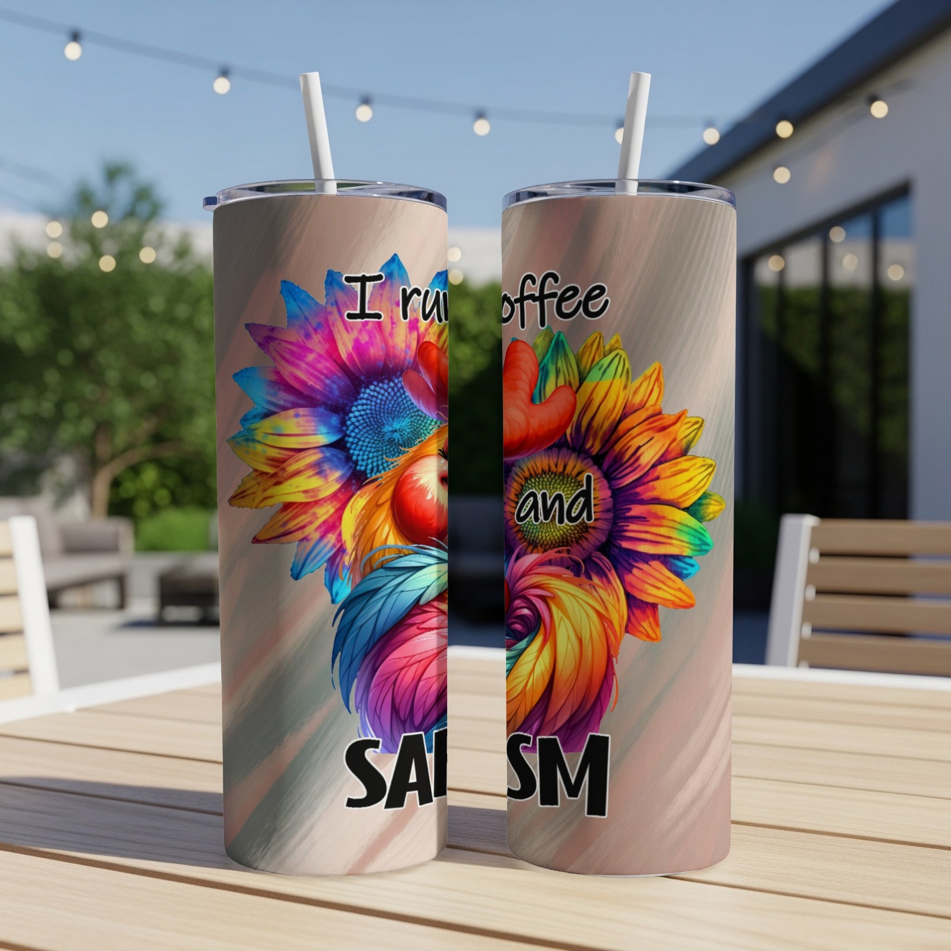 Tumblers with "I run on coffee and sarcasm" text and colorful sunflower design.