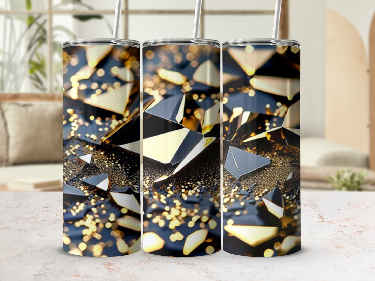 Three tumblers with abstract golden shard and sparkle design.