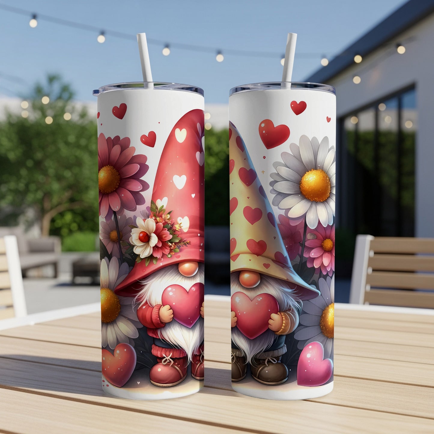 Two Valentine's Day gnomes with hearts on a patterned tumbler.
