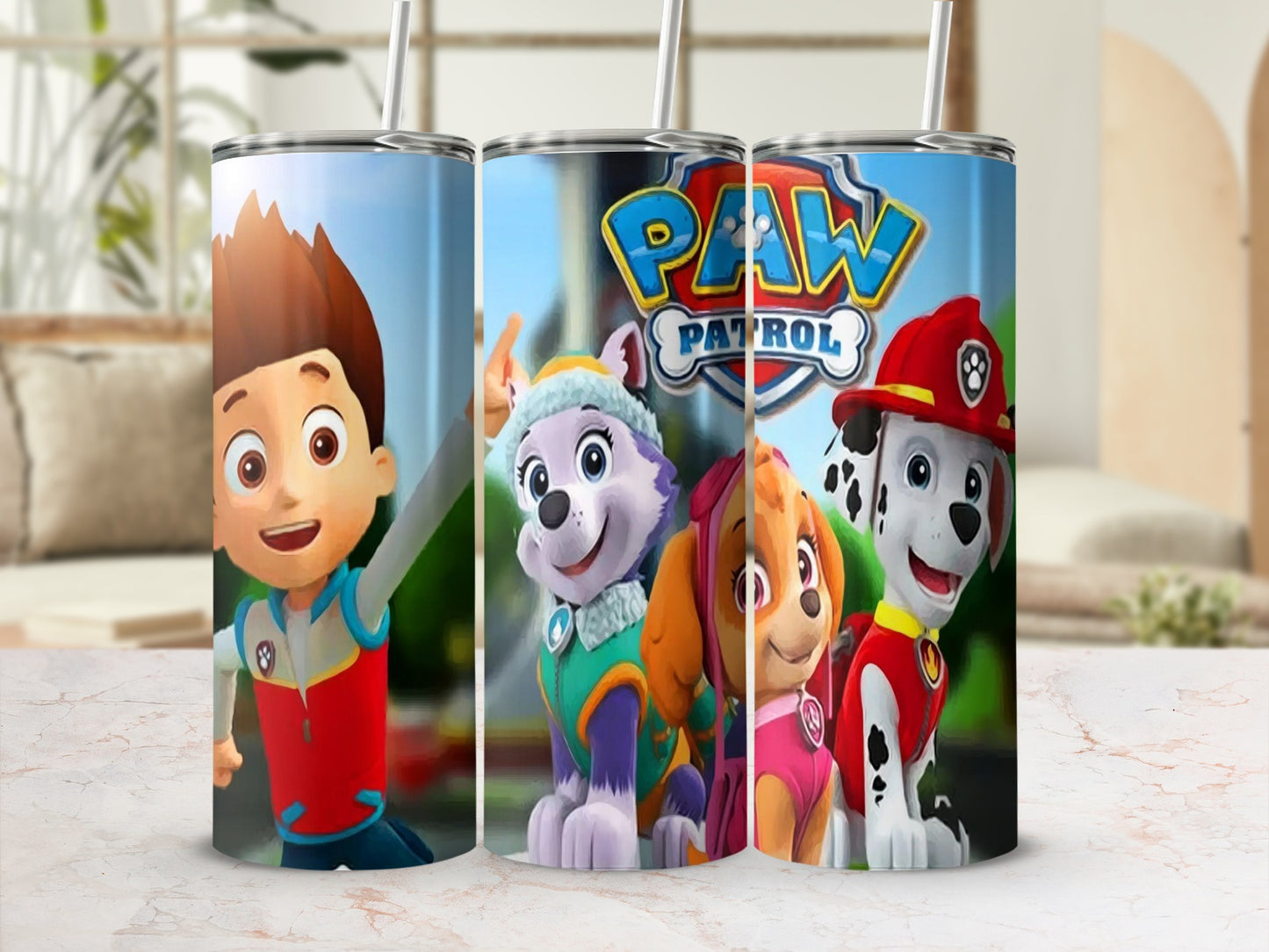Paw Patrol characters Ryder, Skye, Everest, and Marshall on a tumbler.