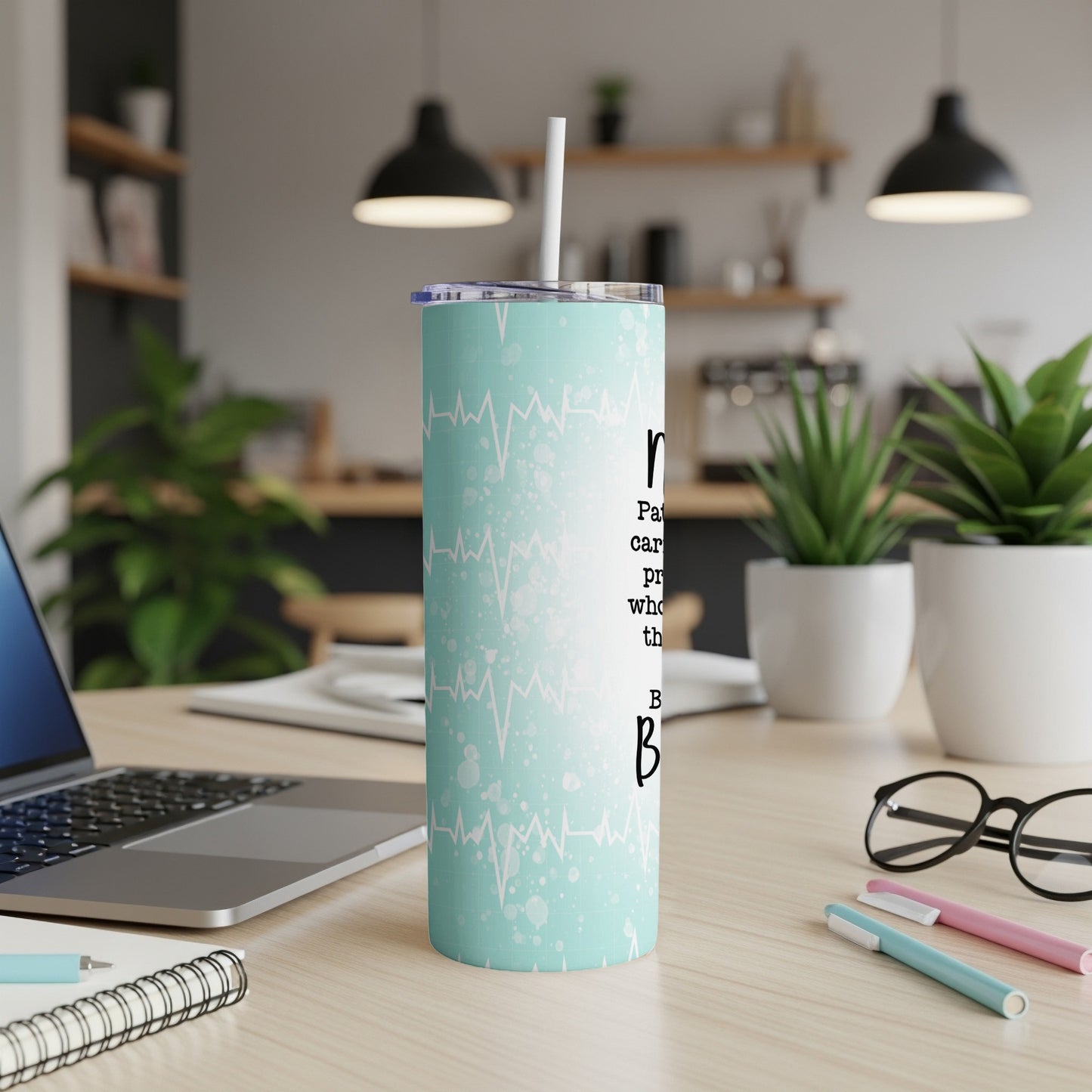 Mint green tumbler with a heartbeat pattern and text reading "nurse".