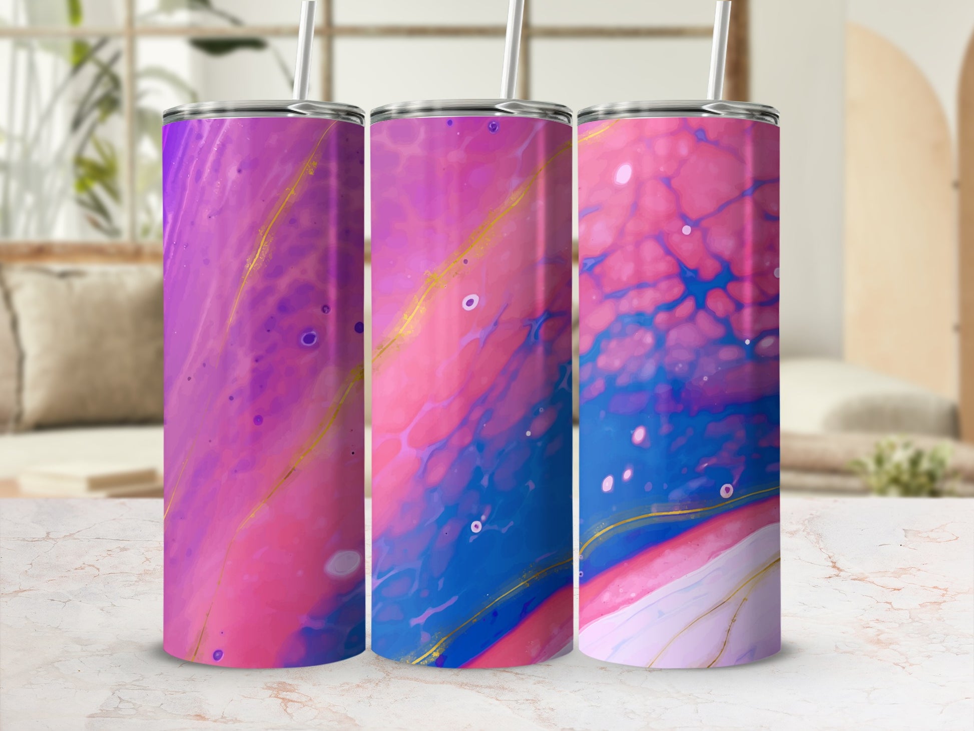 Three tumblers with pink, purple, blue, and gold abstract marble design.