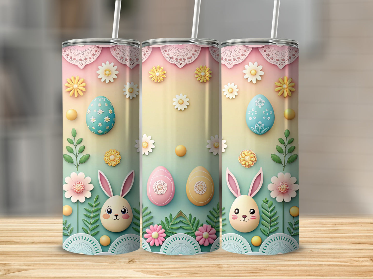 Three pastel Easter themed tumblers with bunnies, eggs, and flowers.