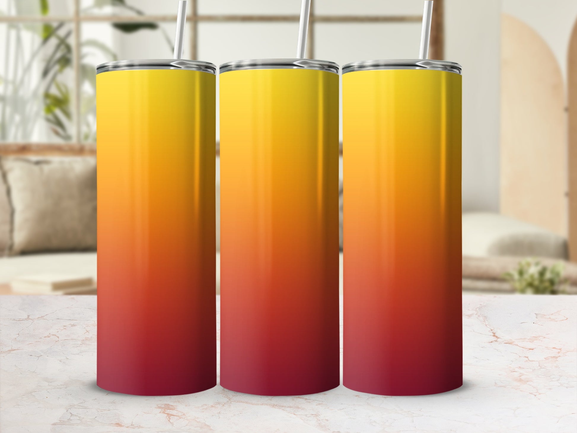 Three tall, straight tumblers with a yellow to red gradient.