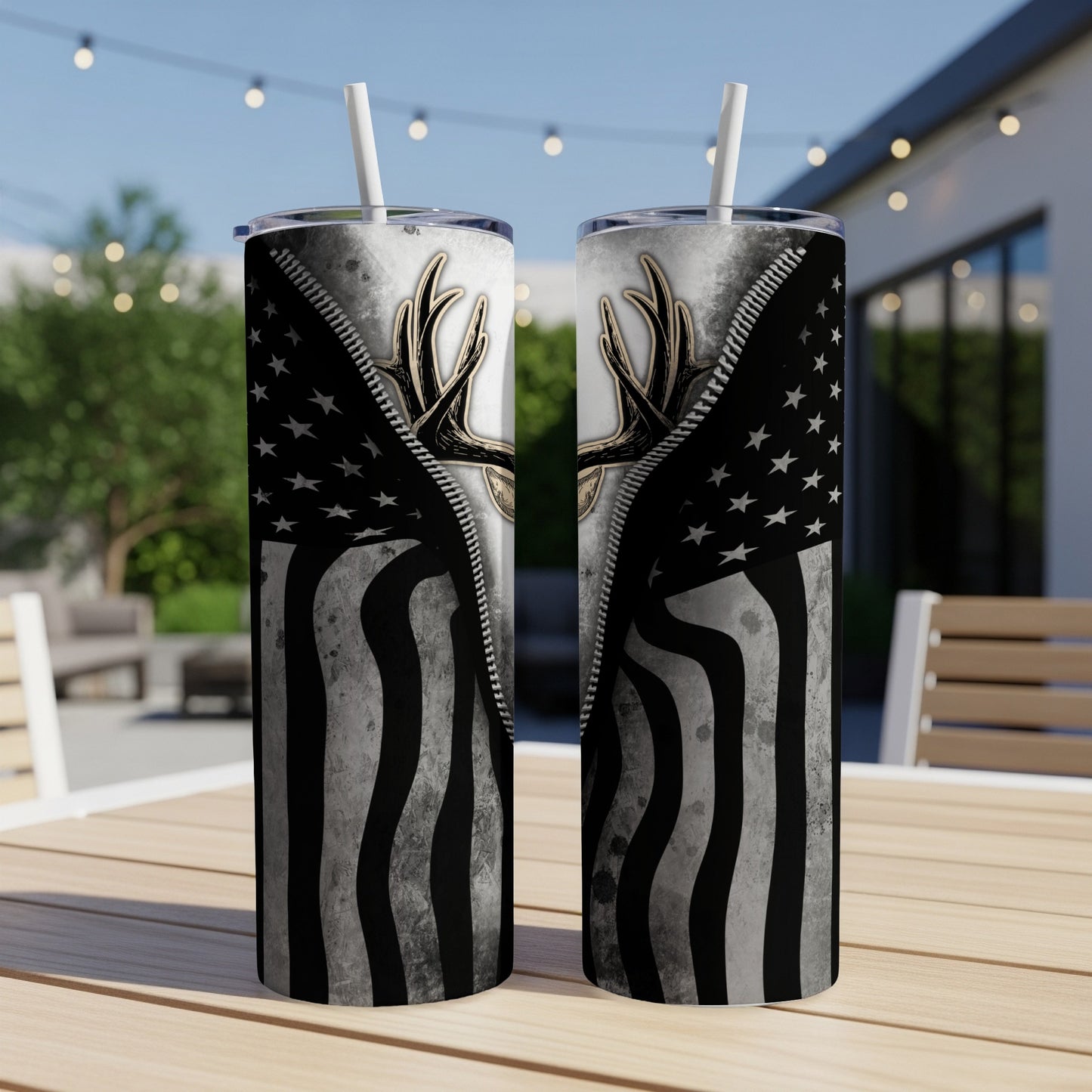 Deer antlers and American flag design on two tumblers.