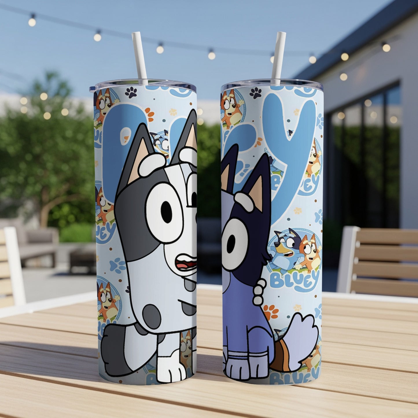 Two Bluey and Bingo character tumblers with a patterned background.
