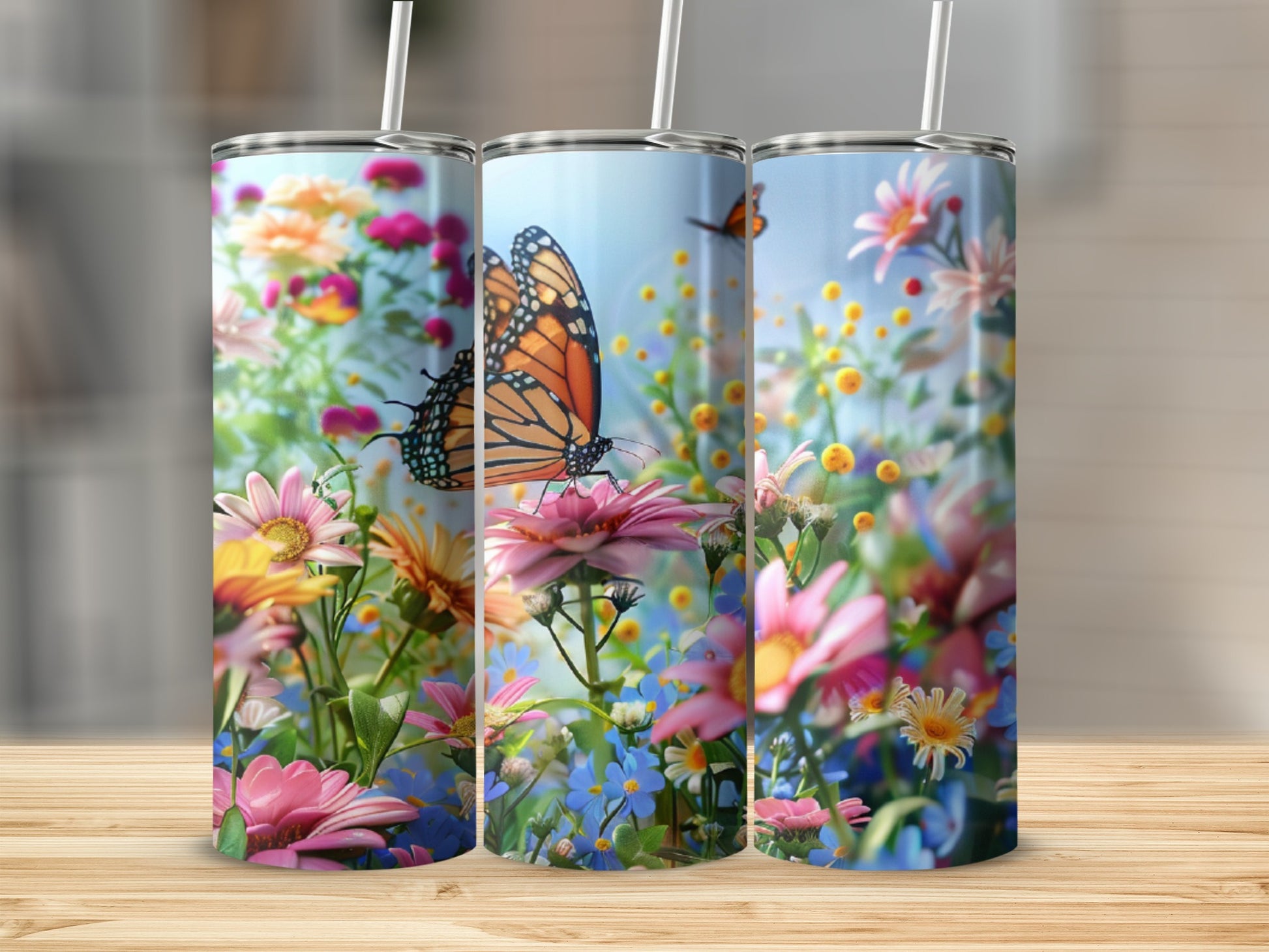 Floral tumbler with monarch butterfly and wildflowers.