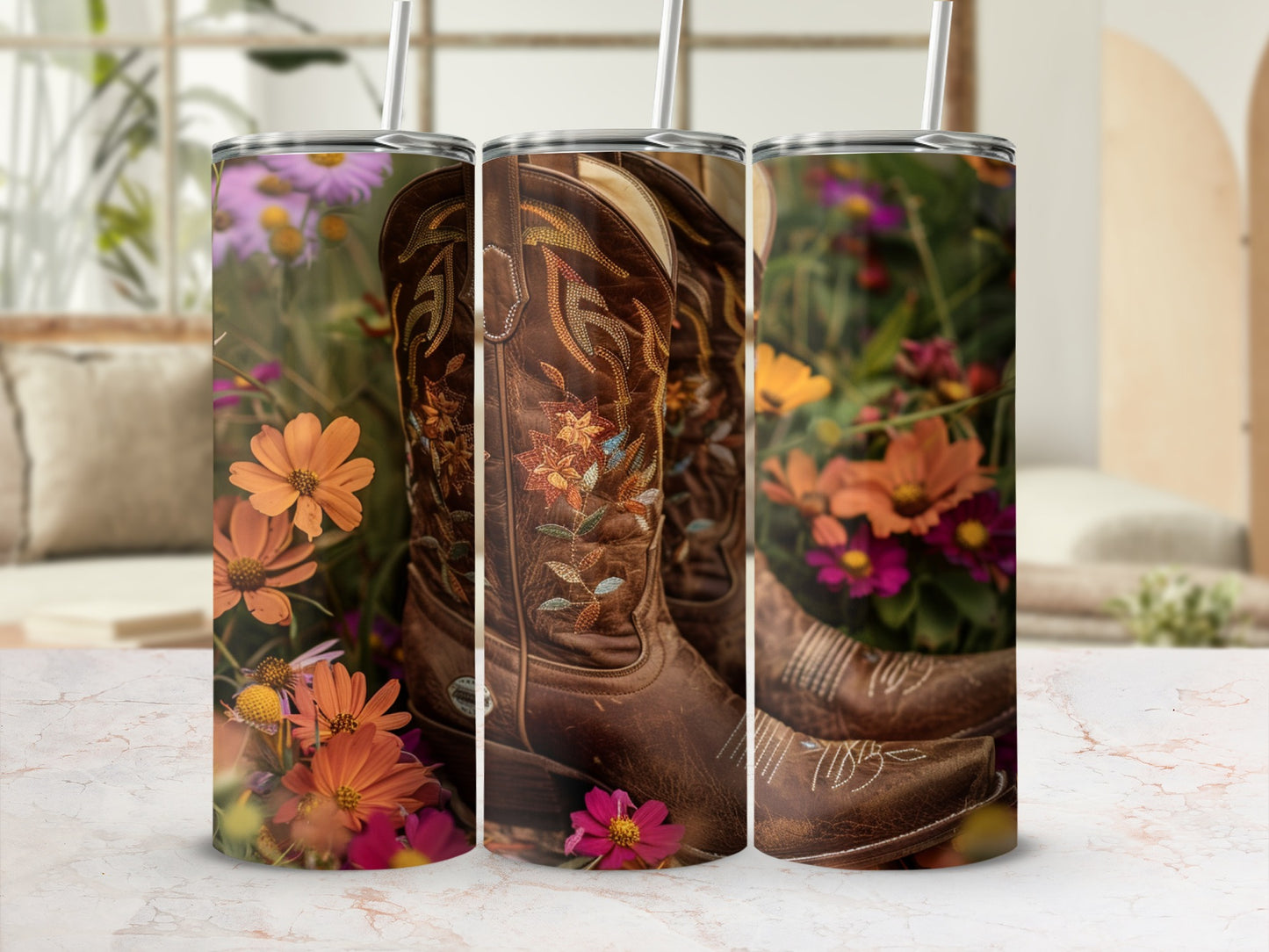 Cowboy boots with floral embroidery and colorful wildflowers on a tumbler.