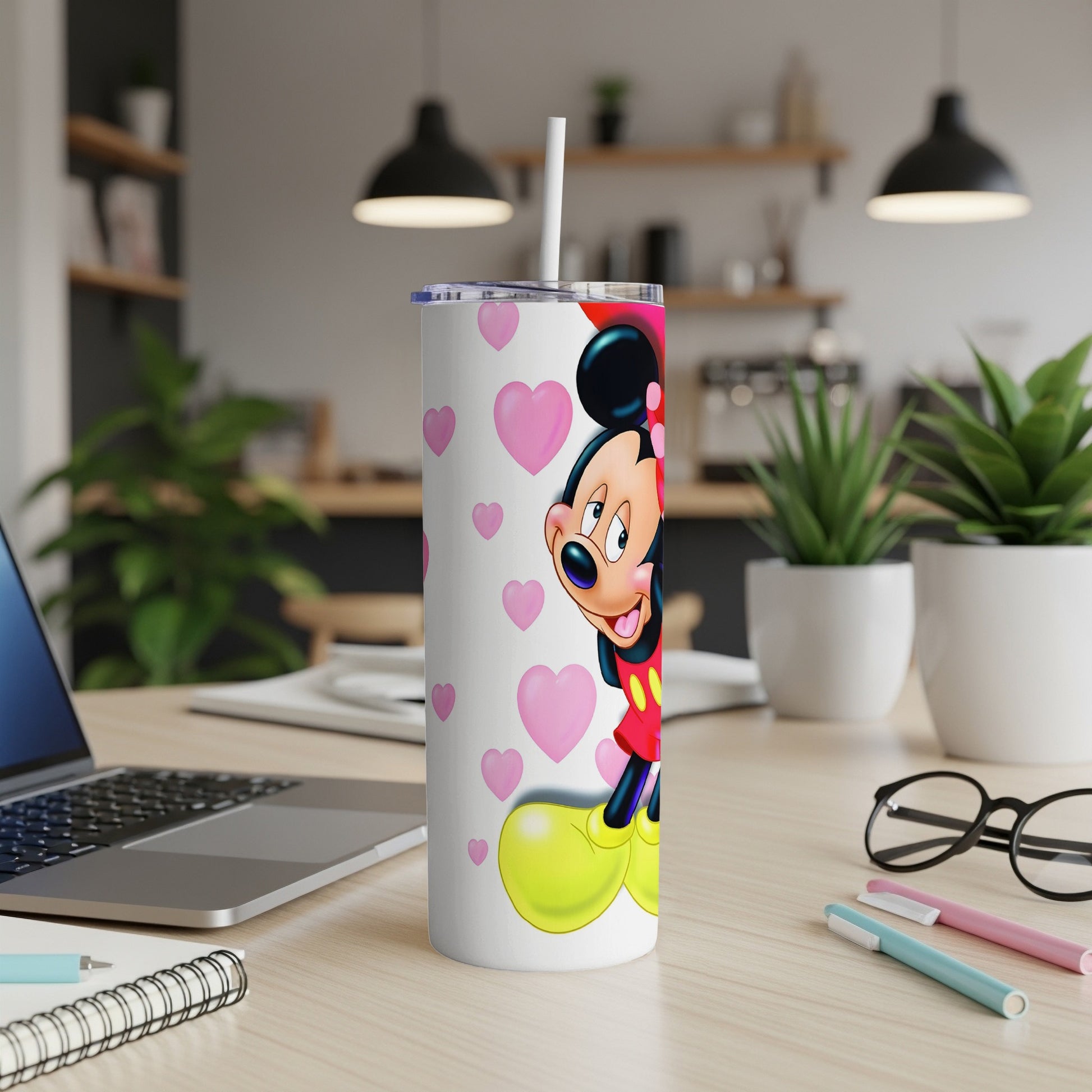 Mickey Mouse on a white tumbler with pink hearts, straw.