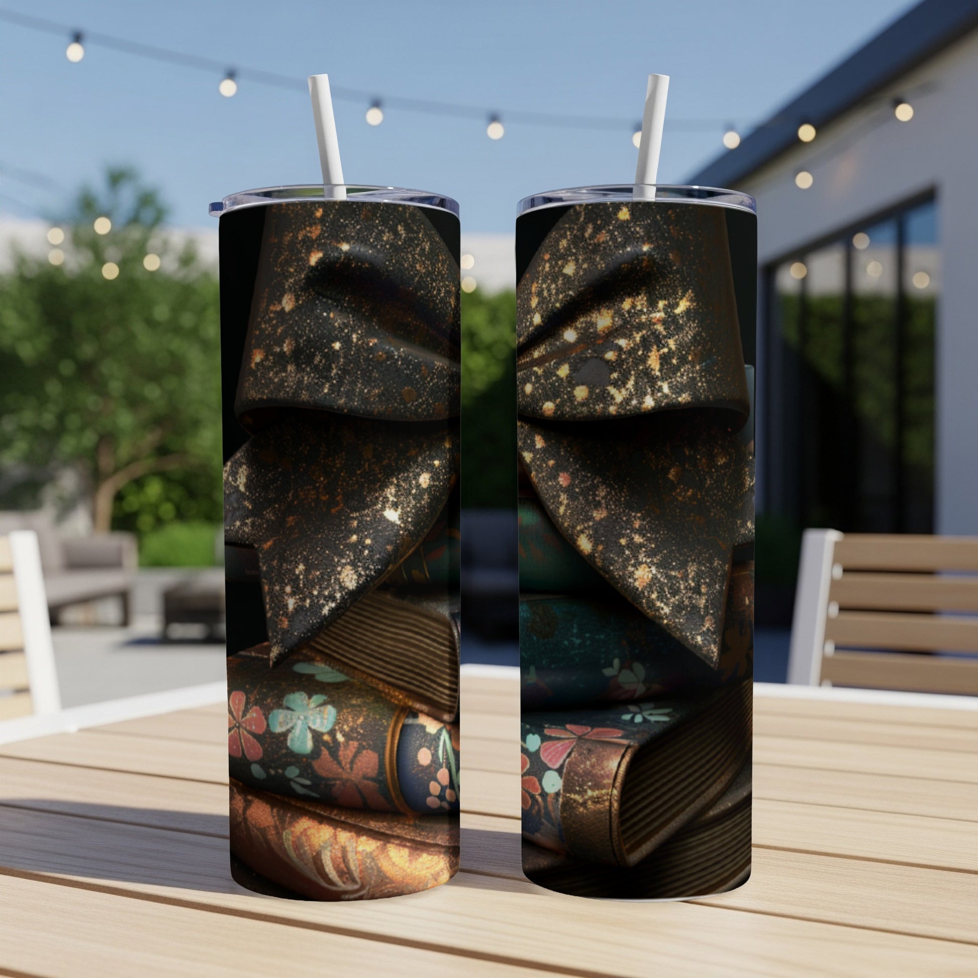 Two tumblers with antique book design and gold accents.